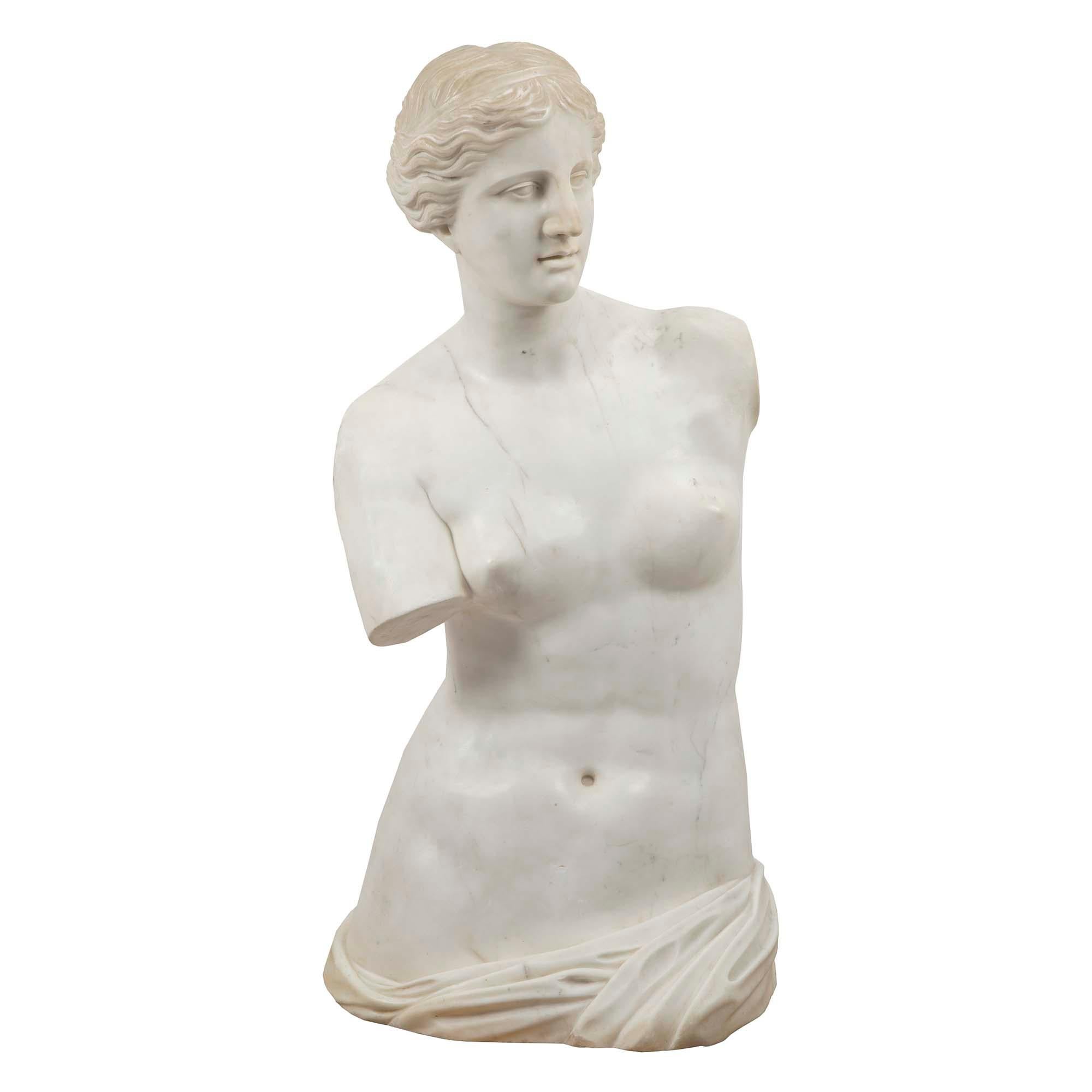 A stunning and large scale Italian 19th century white Carrara marble of Venus de Milo. She is wonderfully sculpted with striking proportions and attention to detail. Venus de Milo is an ancient Greek statue created between 130 and 100 BC and