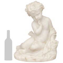 Italian 19th century white Carrara marble statue of a cherub, signed Romanet