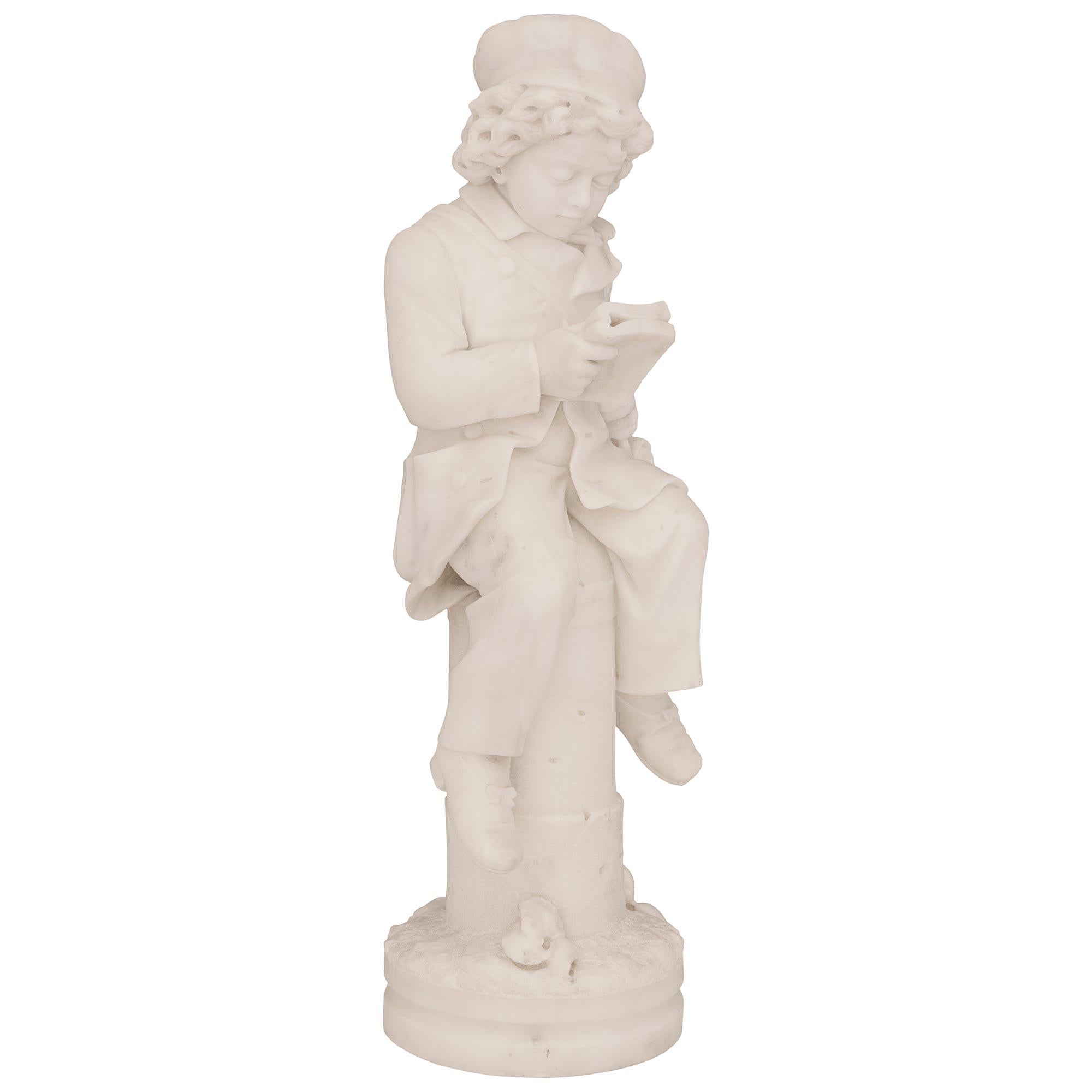 Italian 19th Century White Carrara Marble Statue of a Young Boy Reading a Book In Good Condition For Sale In West Palm Beach, FL