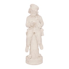 Statua italiana del XIX secolo in marmo bianco di Carrara di un ragazzo che legge un libro