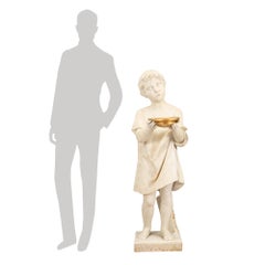 Italian 19th Century White Carrara Marble Statue of a Young Boy with Gilt Accent