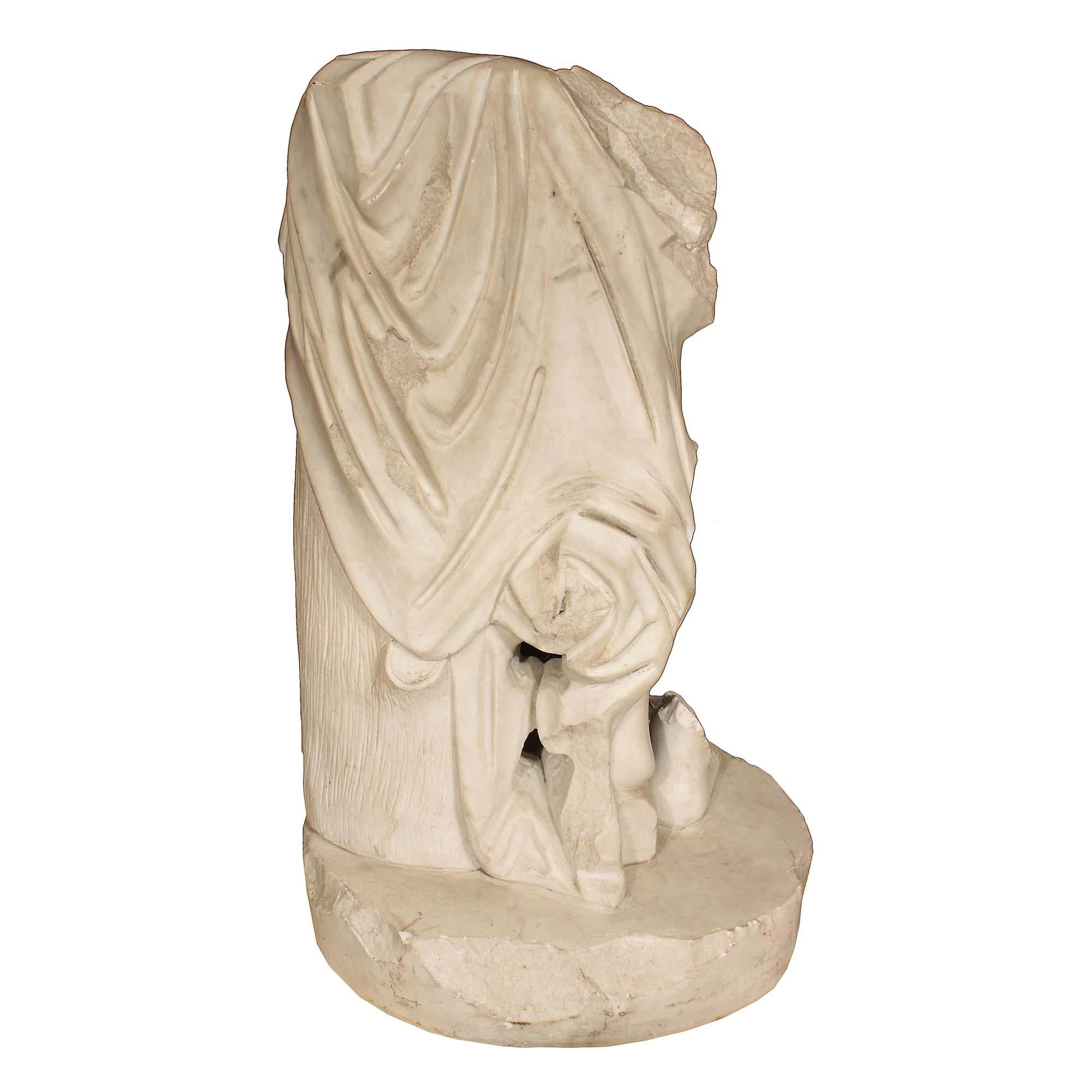 headless armless statue
