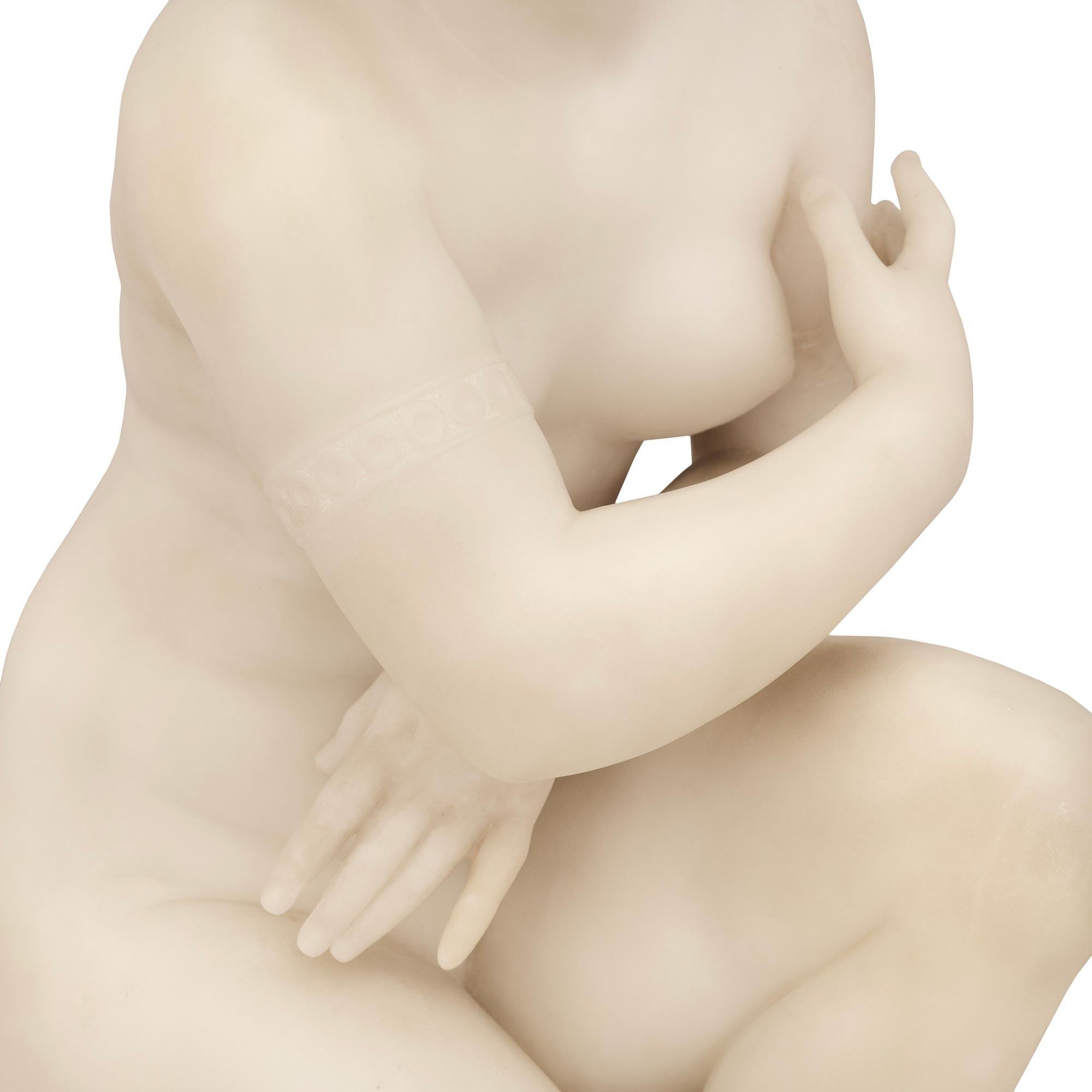 Italian 19th century white Carrara marble statue of the Kneeling Venus For Sale 1