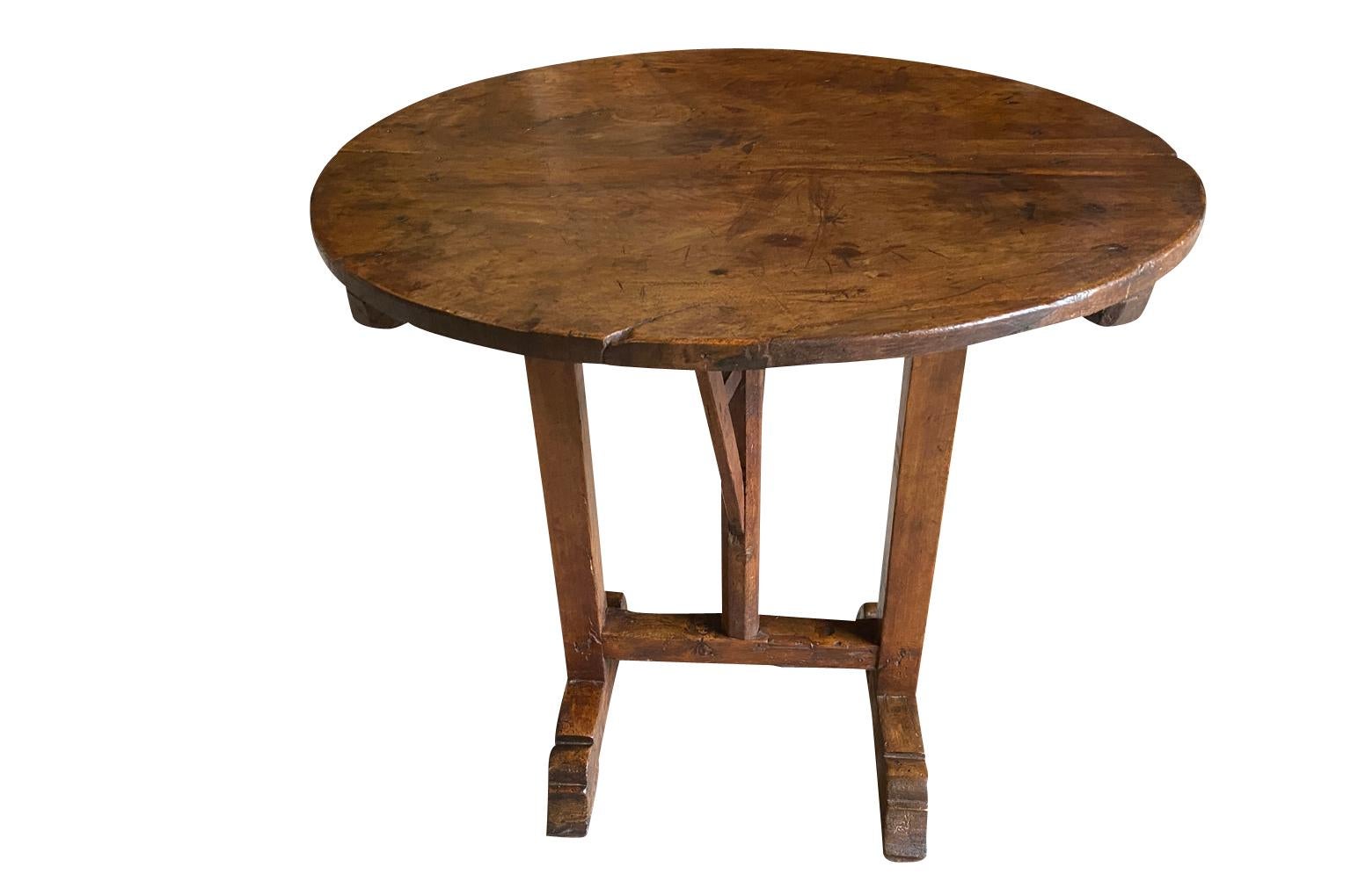 A very charming 19th century Wine Tasting Table from the Tuscan region of Italy.  Beautifully constructed from handsome walnut with a tilting top.  Wonderful patina.