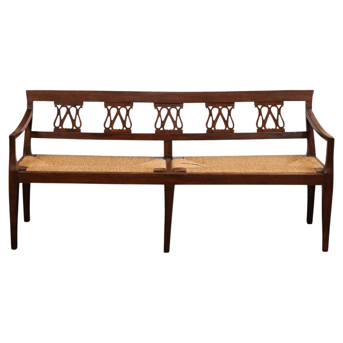 Italian 19th Walnut Bench with Carved Splats, Rush Seat and Tapered Legs For Sale
