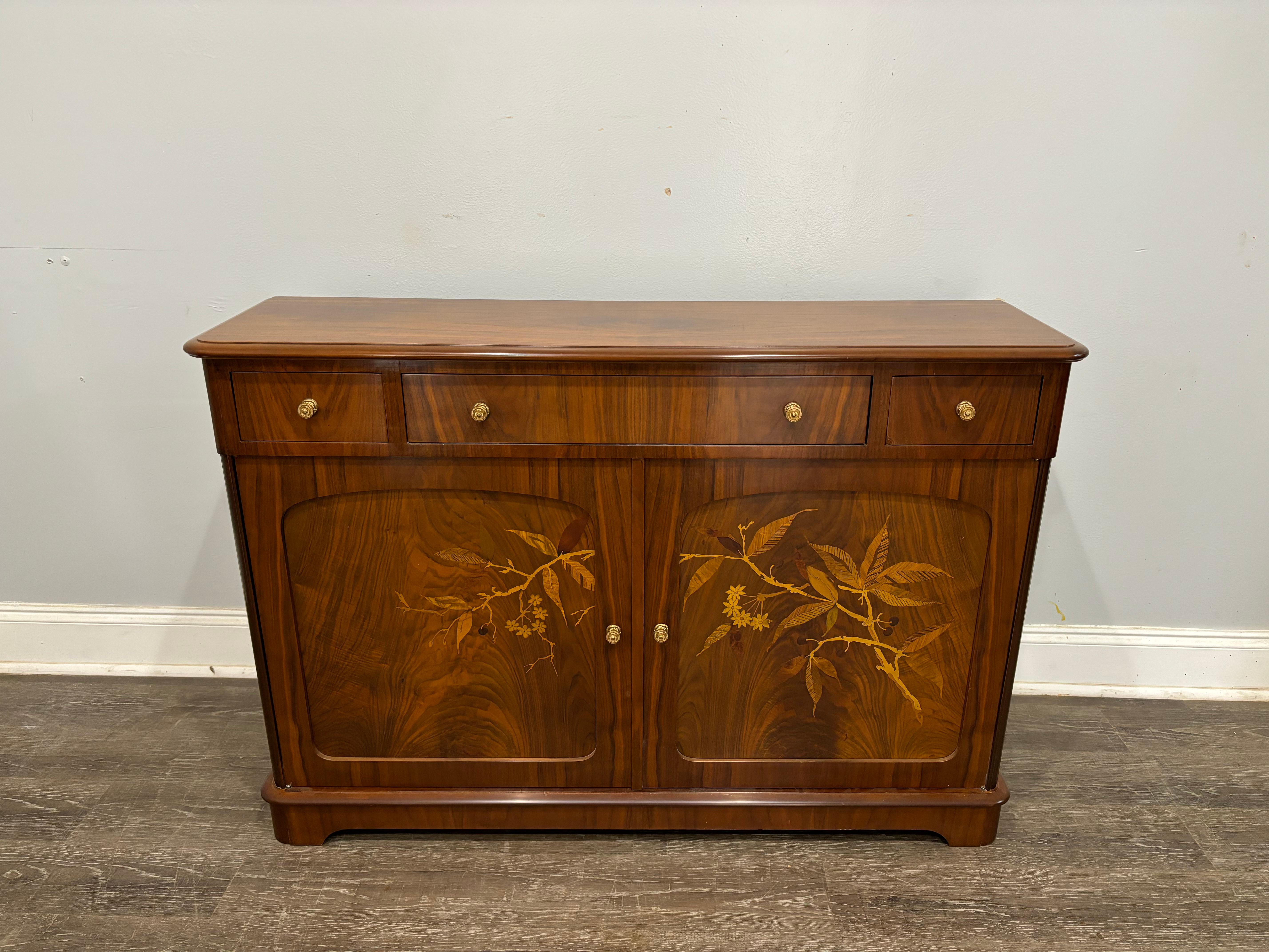 Beautiful wood, and very narrow, this buffet is very quality and signed on the side of the drawer.