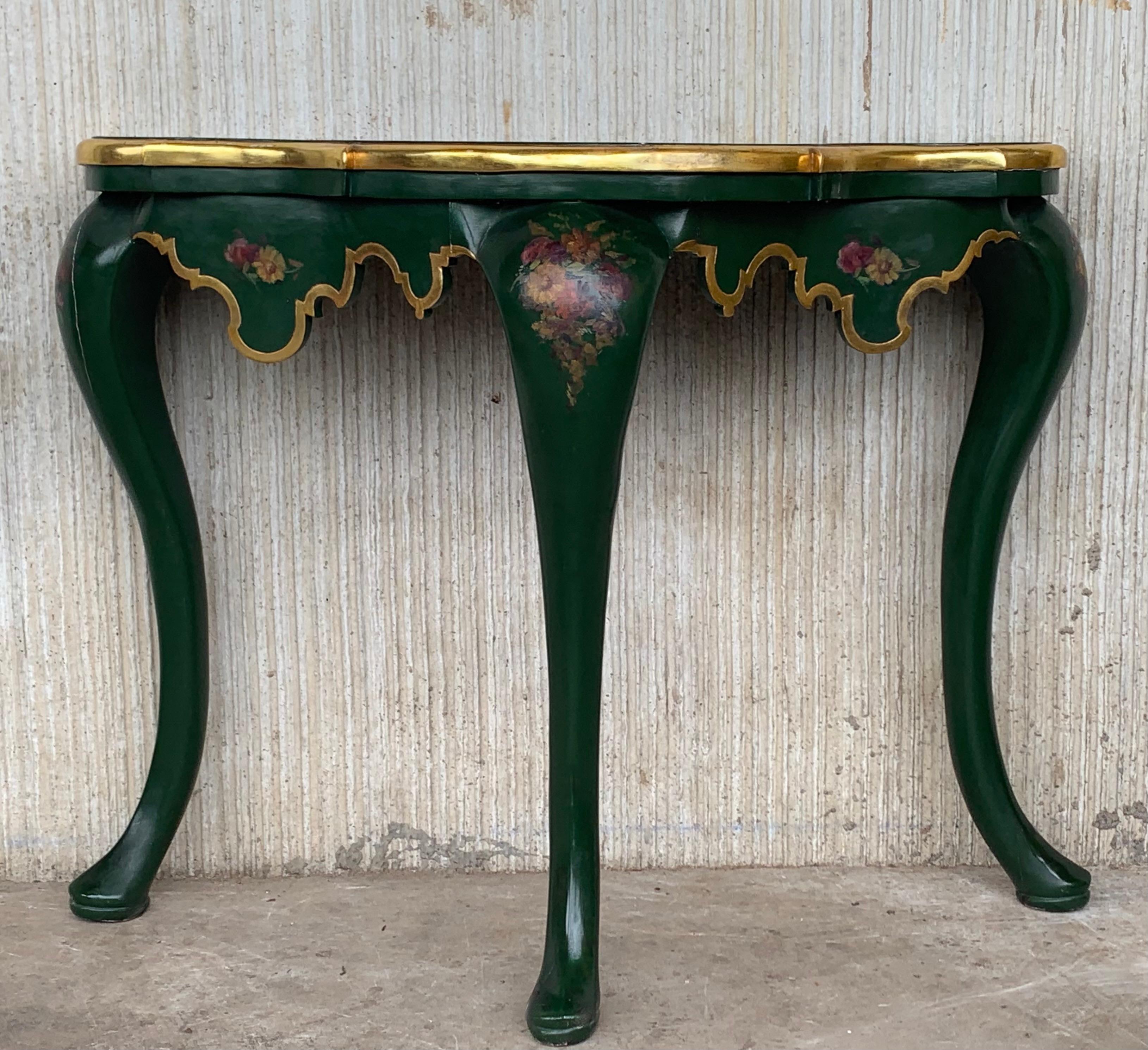 A rare Italian 19th-20th century polychrome painted and floral decorated carved wood console, the serpentine bombé form console decorated with parcel-gilt and colorful floral bouquets over a green painted background, carved with scrolls on cabriole