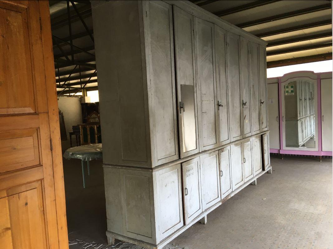 Italian 20th century industrial cabinet or wardrobe in painted wood.
This very large wardrobe comes from an Italian hardware store.
   