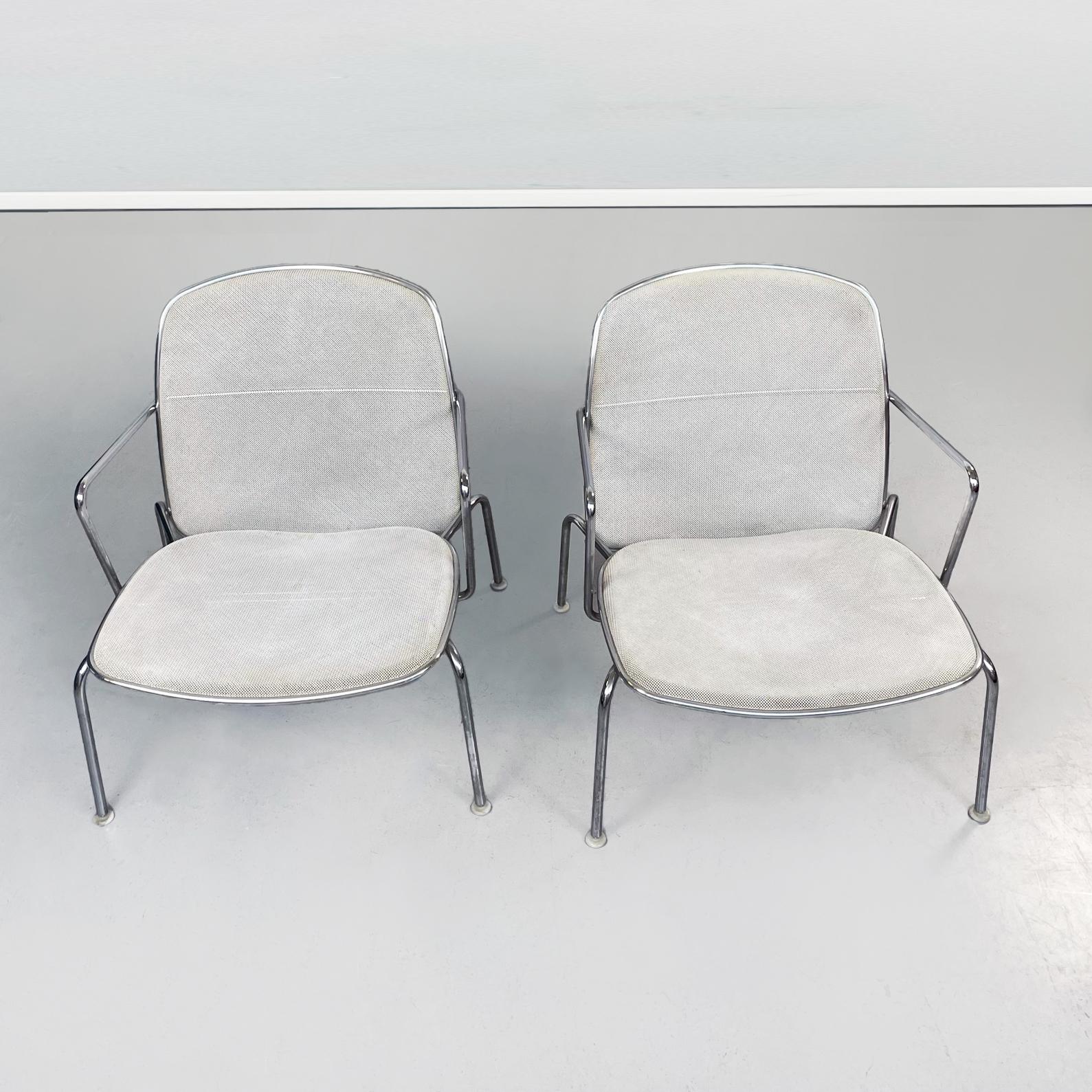 Italian 21st century White metal and steel Web armchairs by Citterio for B&B, 2000s
Pair of Web chairs in chromed steel. The rectangular backrest and seat with rounded corners are in white wire mesh. The structure is in tubular steel. White