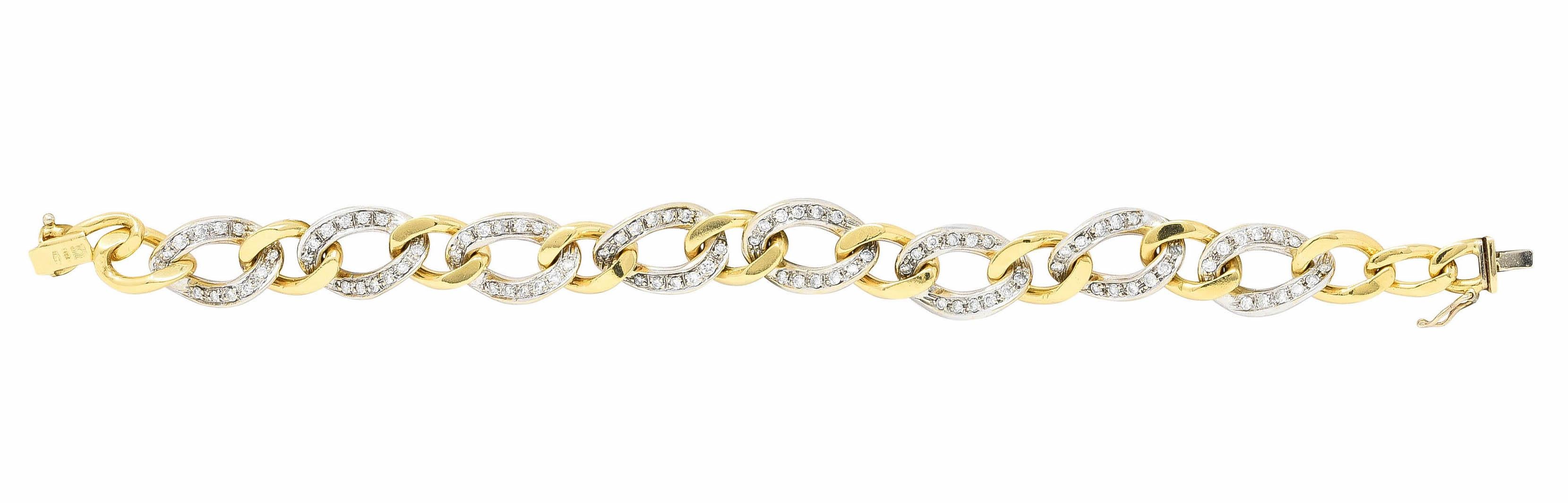 Bracelet is comprised of white gold curb links alternating with smaller polished gold curb links

White gold links are bead set with round brilliant cut diamonds

Weighing in total approximately 2.50 carats with G to J color and SI