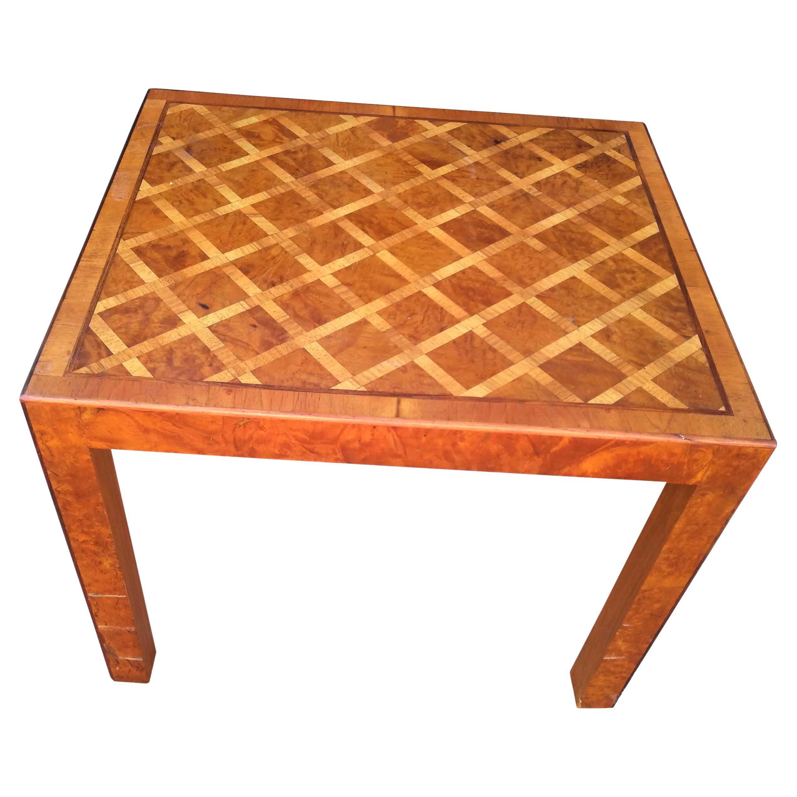 Italian Parquetry Side Table.


 Measure: 27″

End table with a parquet pattern top and a rich burl apron and legs.
Table is stamped made in Italy.