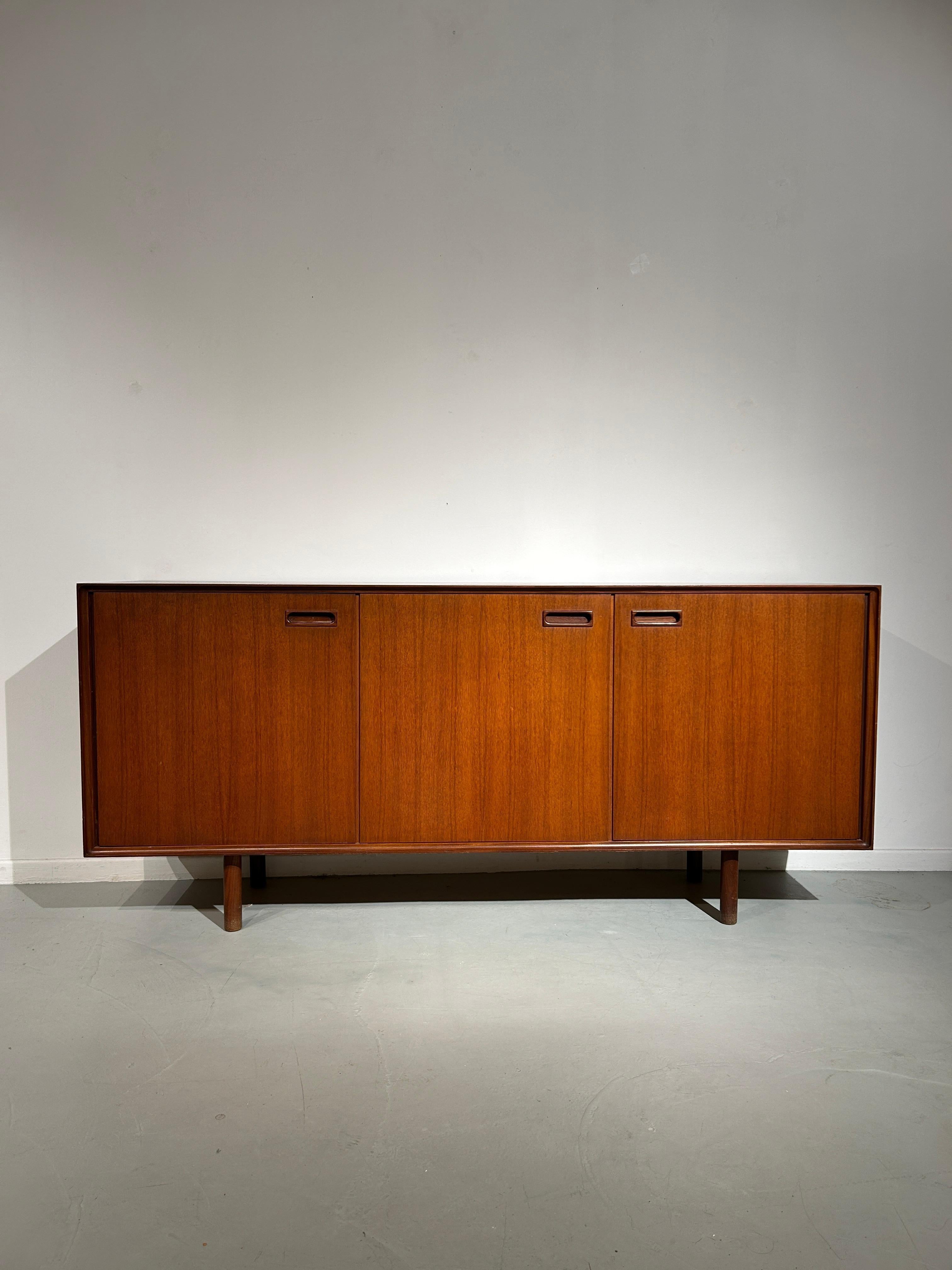 Italian 3 doors sideboard with elegant details. Inside, in the left part, 3 drawers.