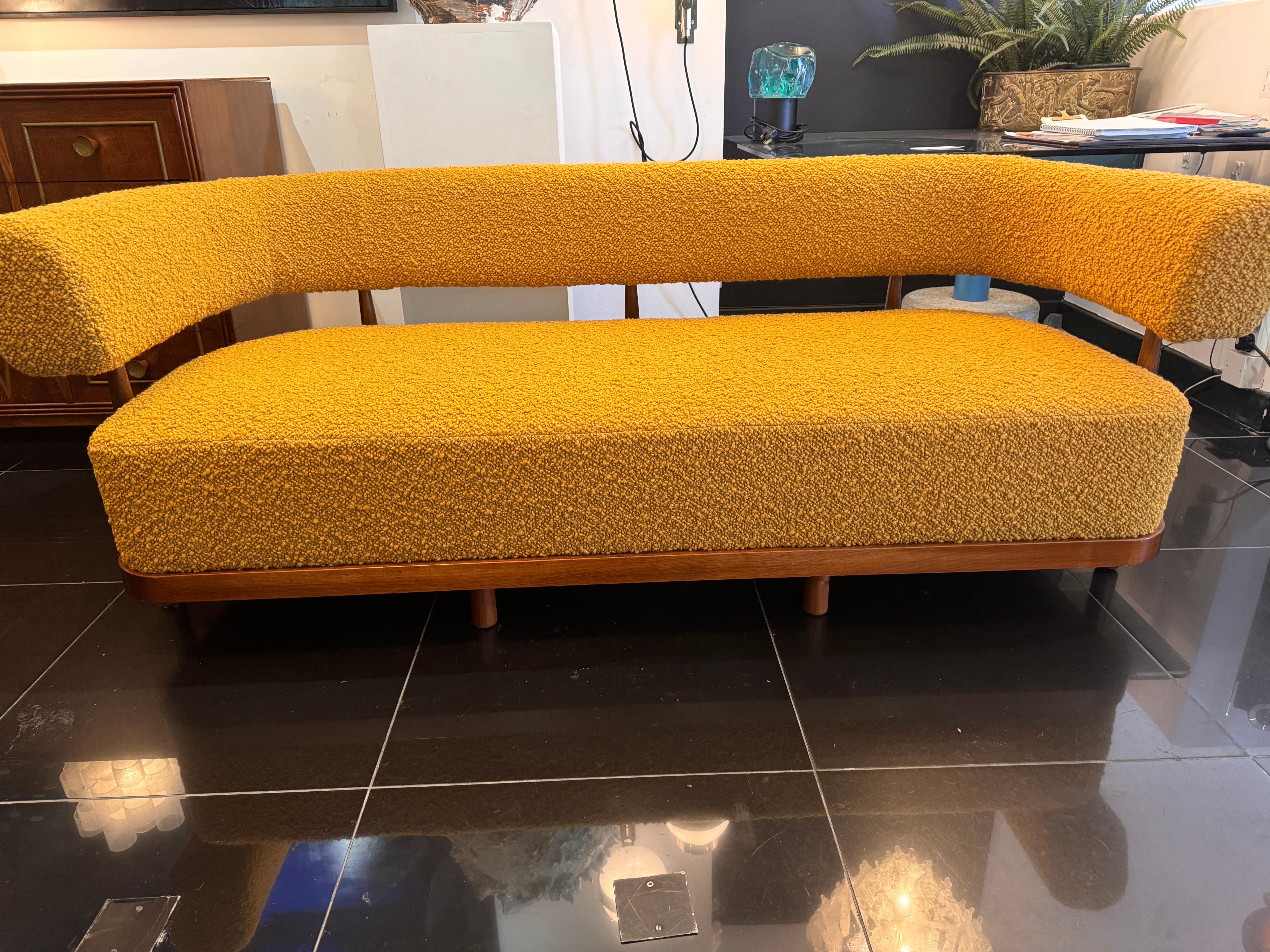 An Rkade studio design 1970s style maple wood sofa covered in mustard lambswool boucle . 
Available to order in cream, black or mustard fine lambs wool boucle . Completion lead time 5/6 weeks from confirmed order . . 
Featured item is in mustard