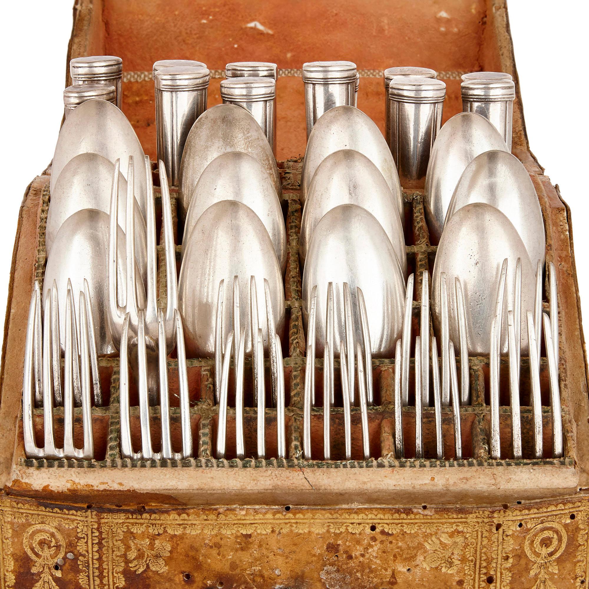 This composite service comprises 36 pieces, the twelve forks, twelve knives, and twelve spoons produced at various points between 1732 and 1815 by at least one Roman maker—Basilio Faffucci. The 36 pieces are fully hallmarked with a variety of date