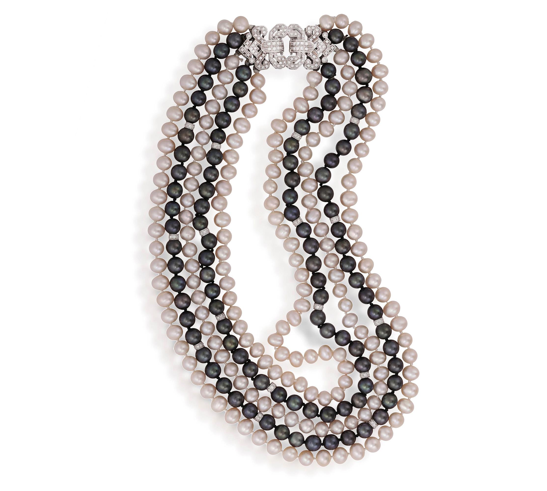 Italian Multi Strand Graduated White Black- Dark Grey PEARL & 2.0ctw DIAMOND 18k White Gold Vintage NECKLACE

You know what piece of jewelry goes with everything, looks great on everyone, and is perfect for any occasion? A pearl necklace! It’s like