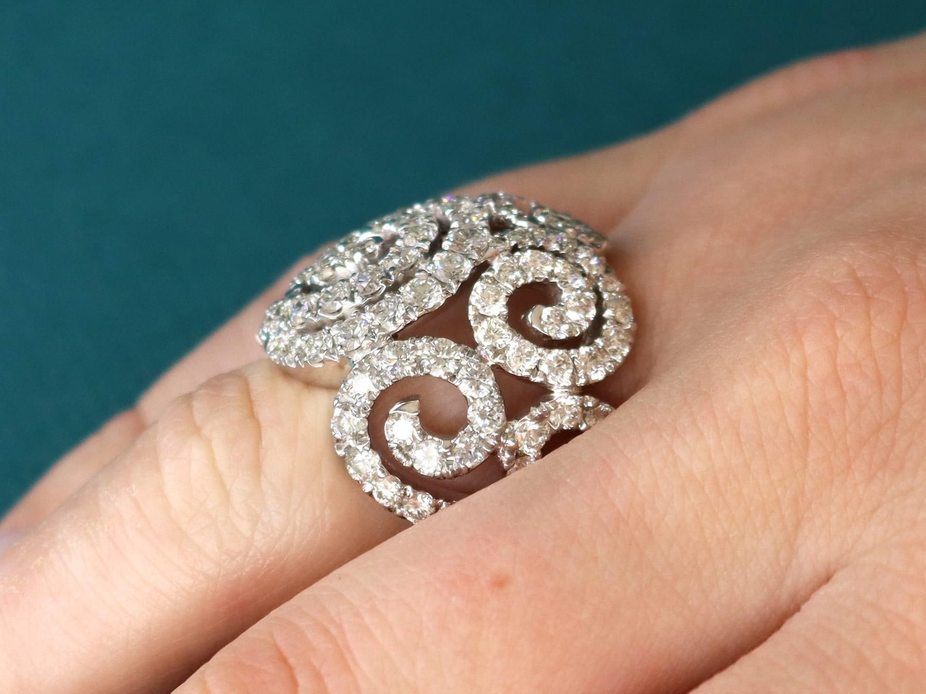 A stunning, fine and impressive vintage Italian 5.08 carat diamond and 18 karat white gold dress ring; part of our diverse diamond jewelry and estate jewelry collections.

This stunning, fine and impressive vintage dress ring has been crafted in 18k