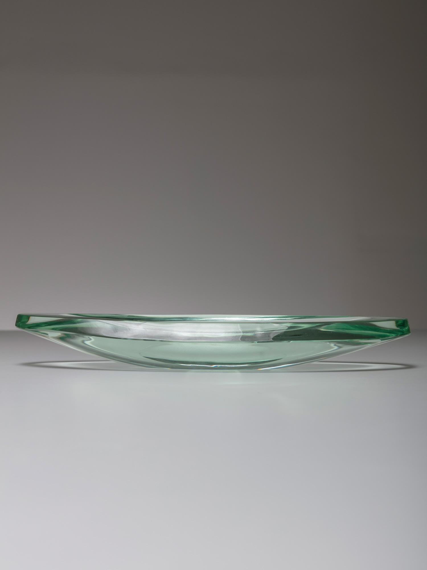 Canoe shaped thick glass tray.