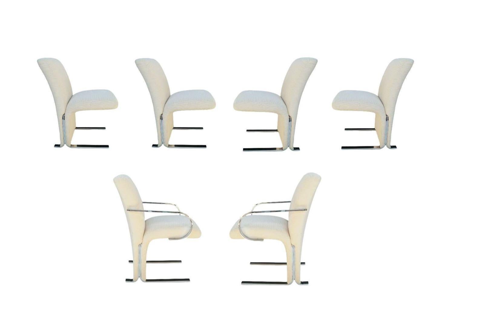 The size shown is for the 4 side chairs. The 2 arm head chairs measure 33.50