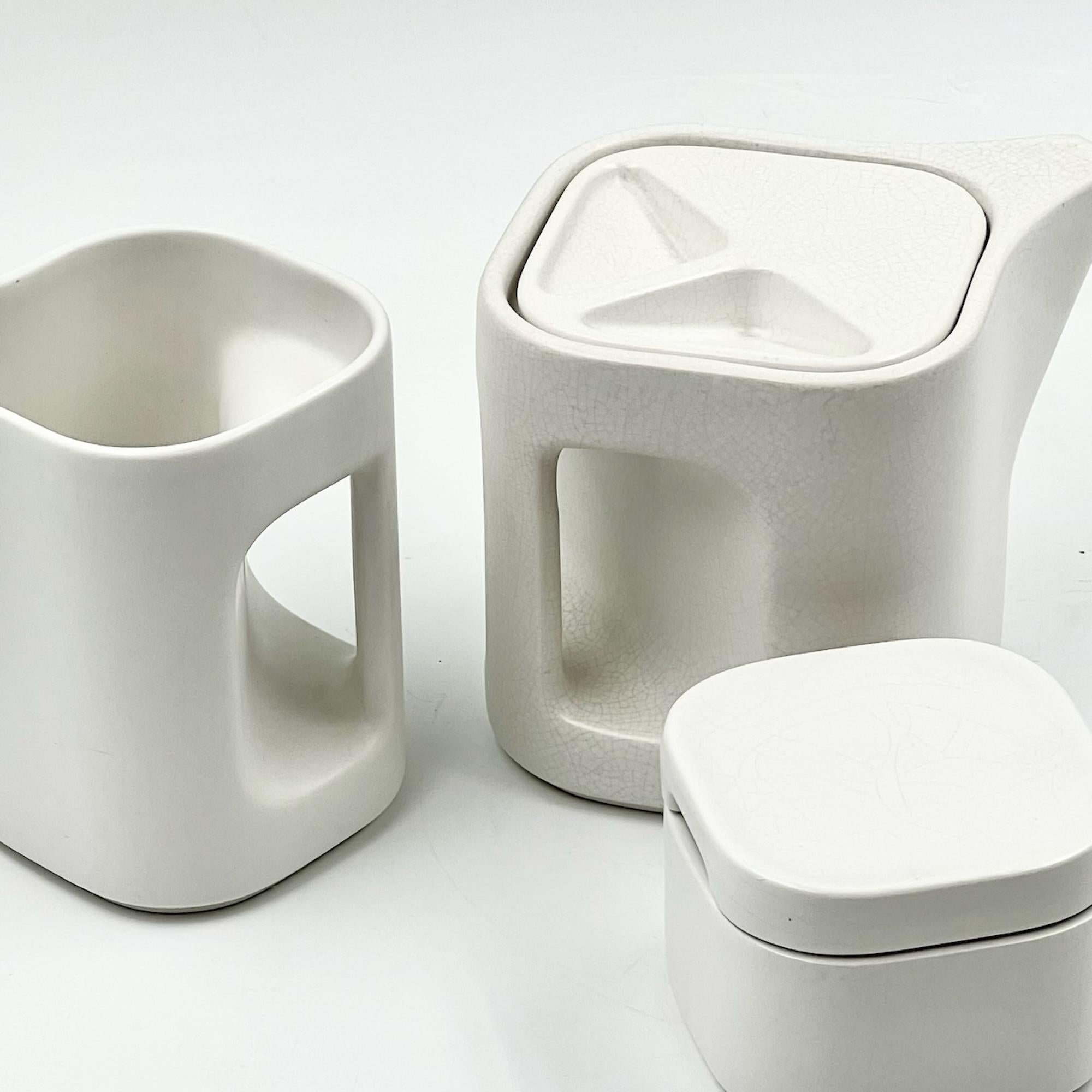 Step back in time with the exquisite 70s Ceramic Coffee Set from the Arnolfo di Cambio Collection, designed by the legendary Makio Hasuike and manufactured by Ceramiche Revelli, Laveno Italy. This Iconic coffee or tea set for six is a true testament