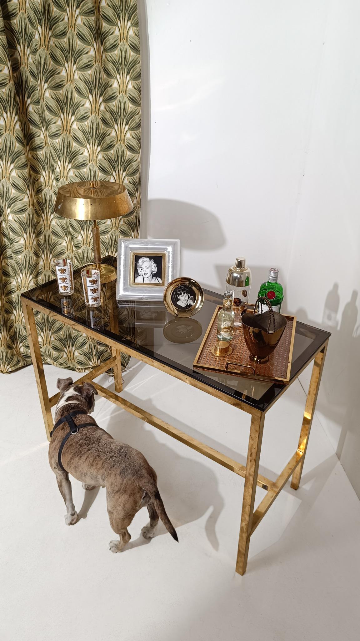 We are pleased to offer for sale an elegant Italian tabletop picture frame from the 1970s.

Still featuring its original adhesive label, this vintage piece is part of a collection of home accessories designed—or at least produced—by Alberto Sordi,