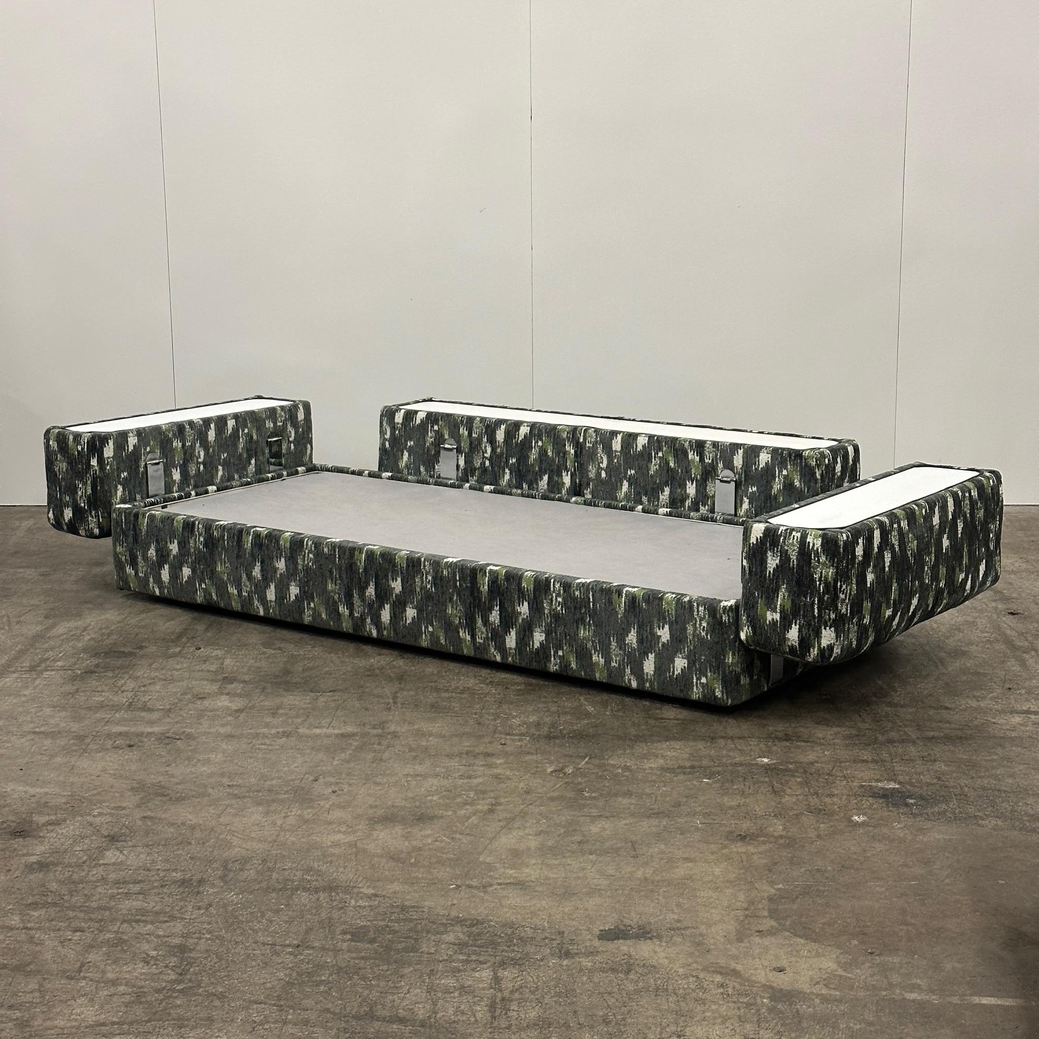 c. 1960s. Imported by Stendig. The 711 daybed by Tito Agnoli, reupholstered in a chenille from Fishman’s fabrics. Classic Italian modern design, with the laminate tables when the bed is transformed.