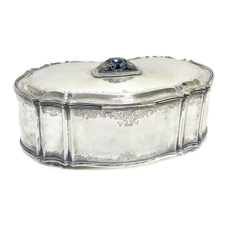 Italian 800 silver diamond and sapphire table box with key, 1st half 20th century. Applied diamond and sapphire jewels to the lid and clasp, however the large top sapphire stone is likely synthetic. Fabric lined interior. With original working