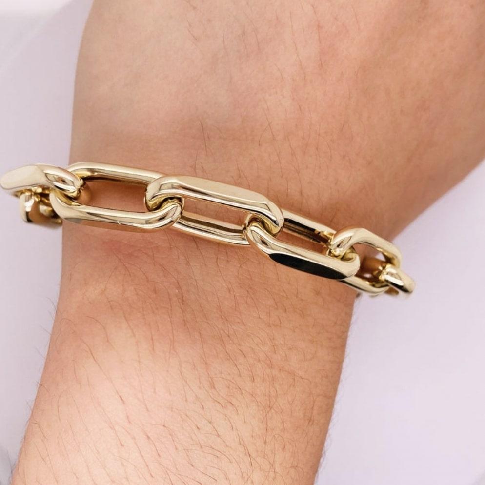 This fantastic 9 millimeter (mm) wide paperclip large link bracelet was made for us in Italy with recycled 14 karat gold and finished beautifully to the high standards Italian jewelry is known for! This wonderful statement chain is made affordable