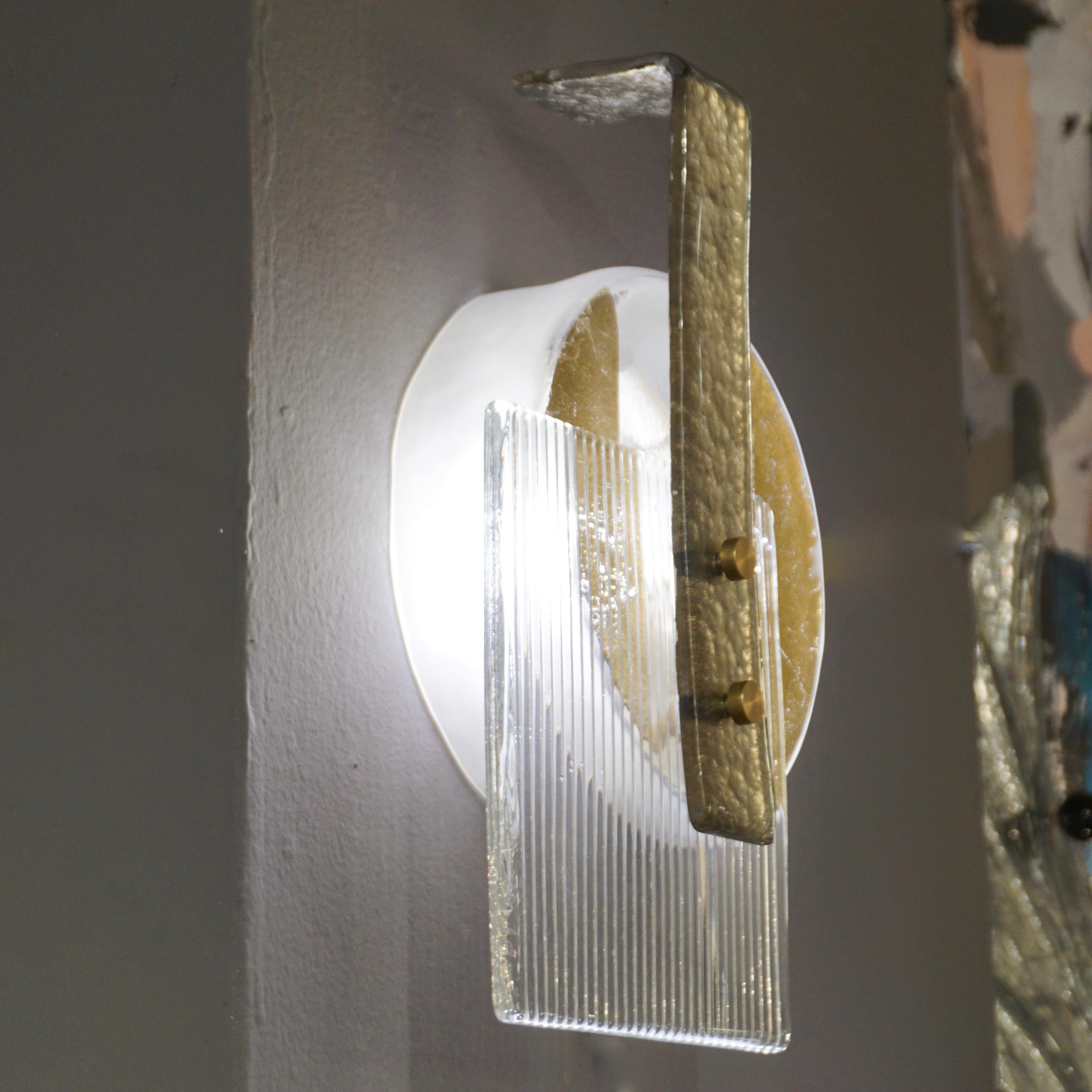 Contemporary Venetian elegant modernist geometric wall light/ flush mount, abstract sculpture Design, entirely handcrafted and cleverly composed of three sophisticated textured Murano Art glass pieces: an L-shape glass element worked with hammered