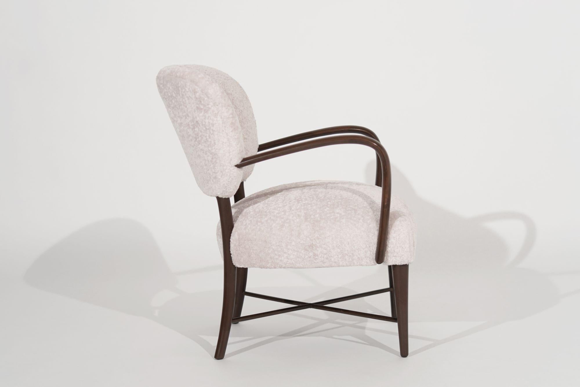 An organic style Italian open-arm lounge chair in the style of Paolo Buffa, the walnut frame is fully restored and reupholstered in soft Great Plains wool by Holly Hunt.
 
Other designers working in the organic style include Adrian Pearsall, Jean