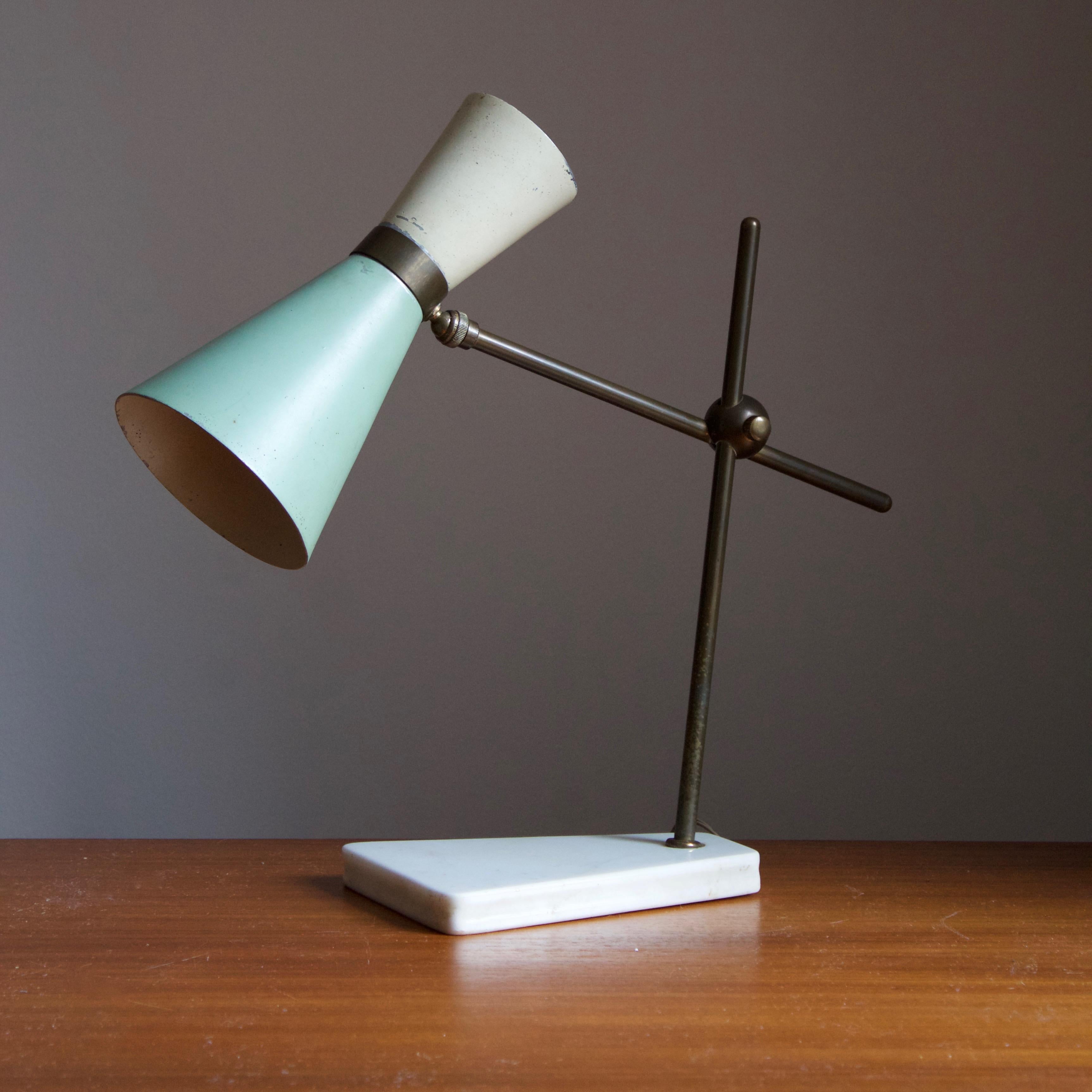An adjustable table lamp. In wood, metal, and copper. Sourced in Italy. 

Other designer of the period include Gio Ponti, Franco Albini, Angelo Lelii, and Max Ingrand.
