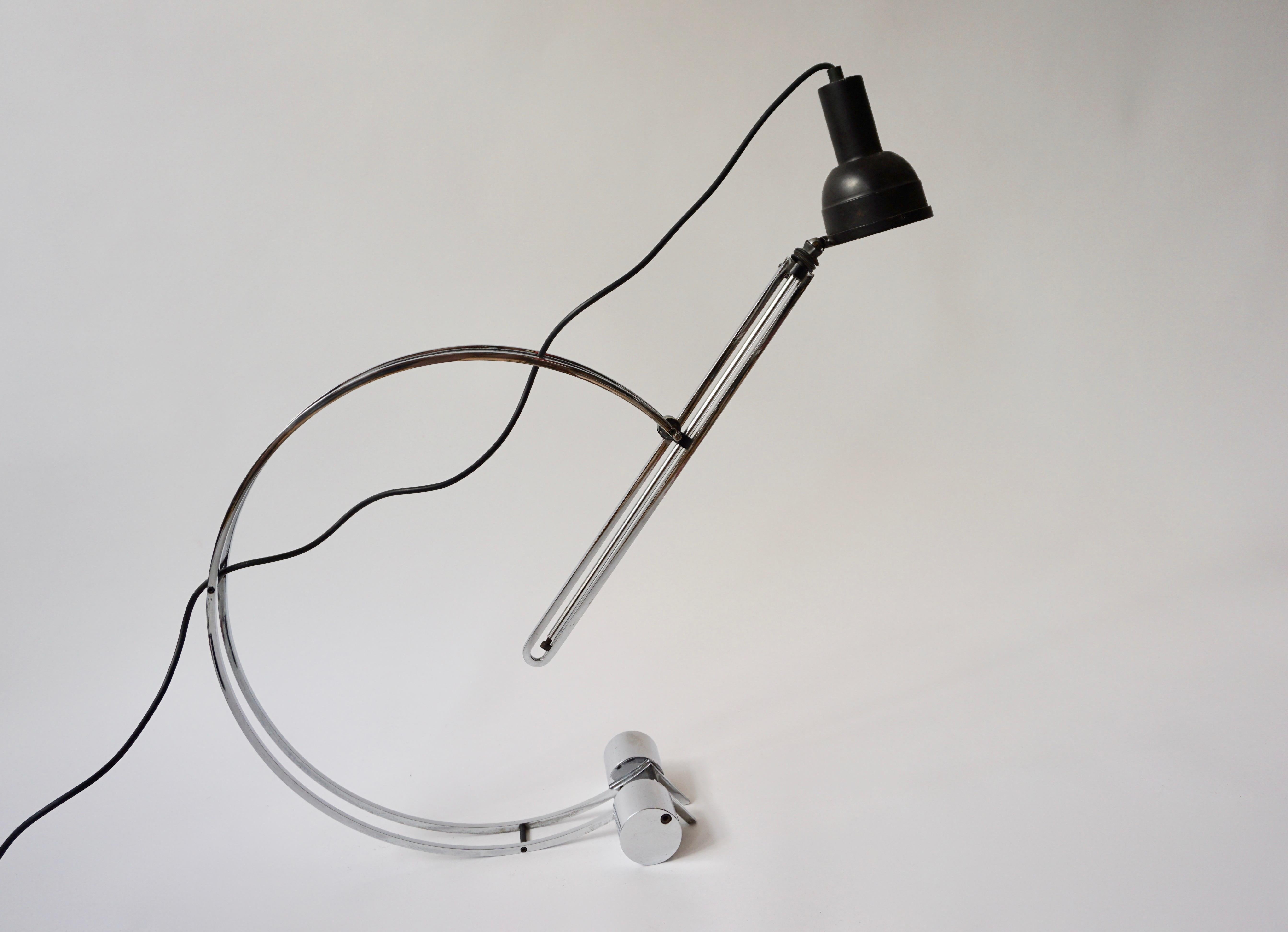 Italian adjustable table lamp.

width 100 cm.
Height 80 cm.
Depth 19 cm.