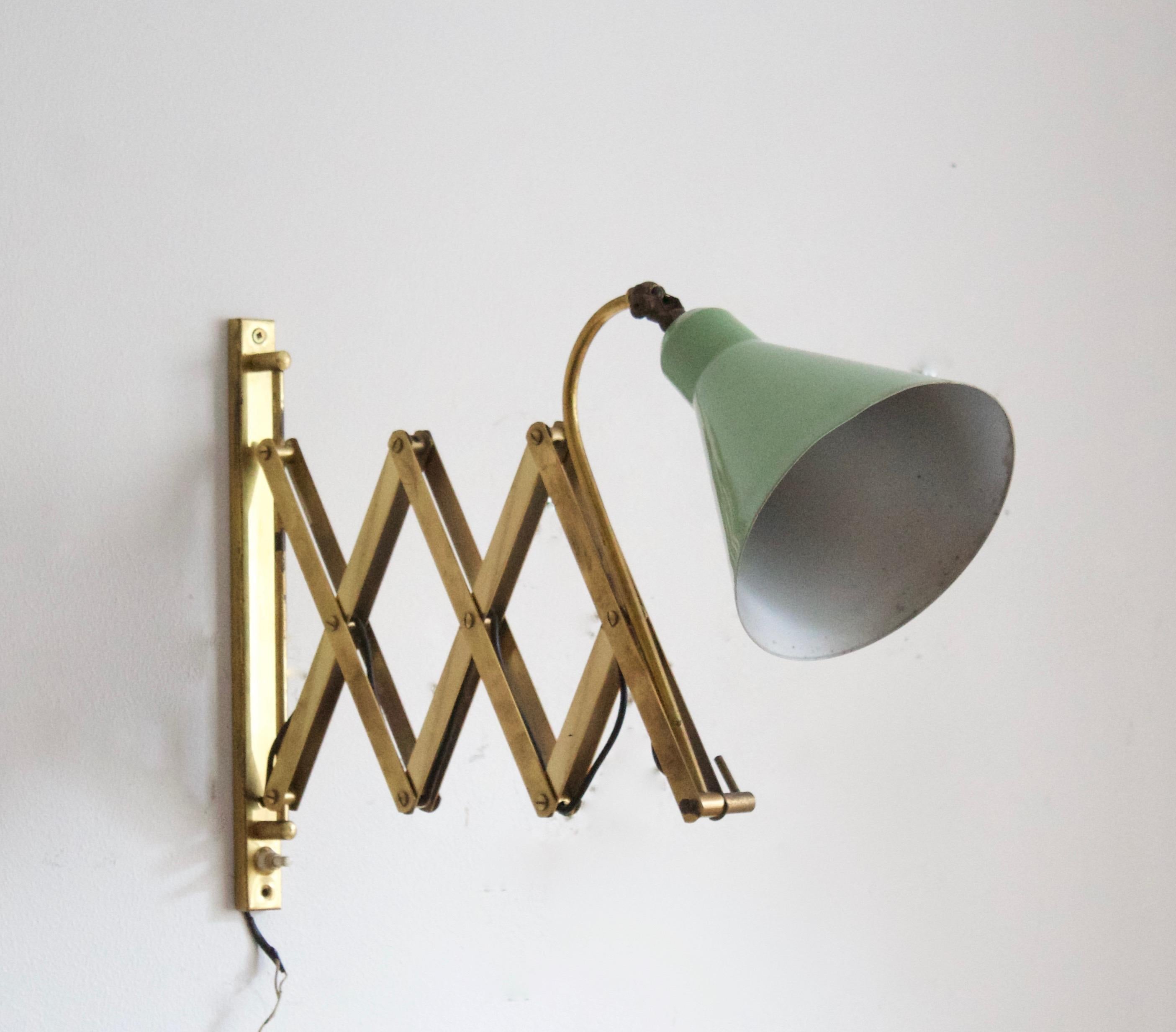 A sizable wall light / task light. Designed and produced in Italy, 1940s.

Other designers of the period include Paavo Tynell, Jean Royère, Hans Bergström, Hans-Agne Jakobsson, and Kaare Klint.