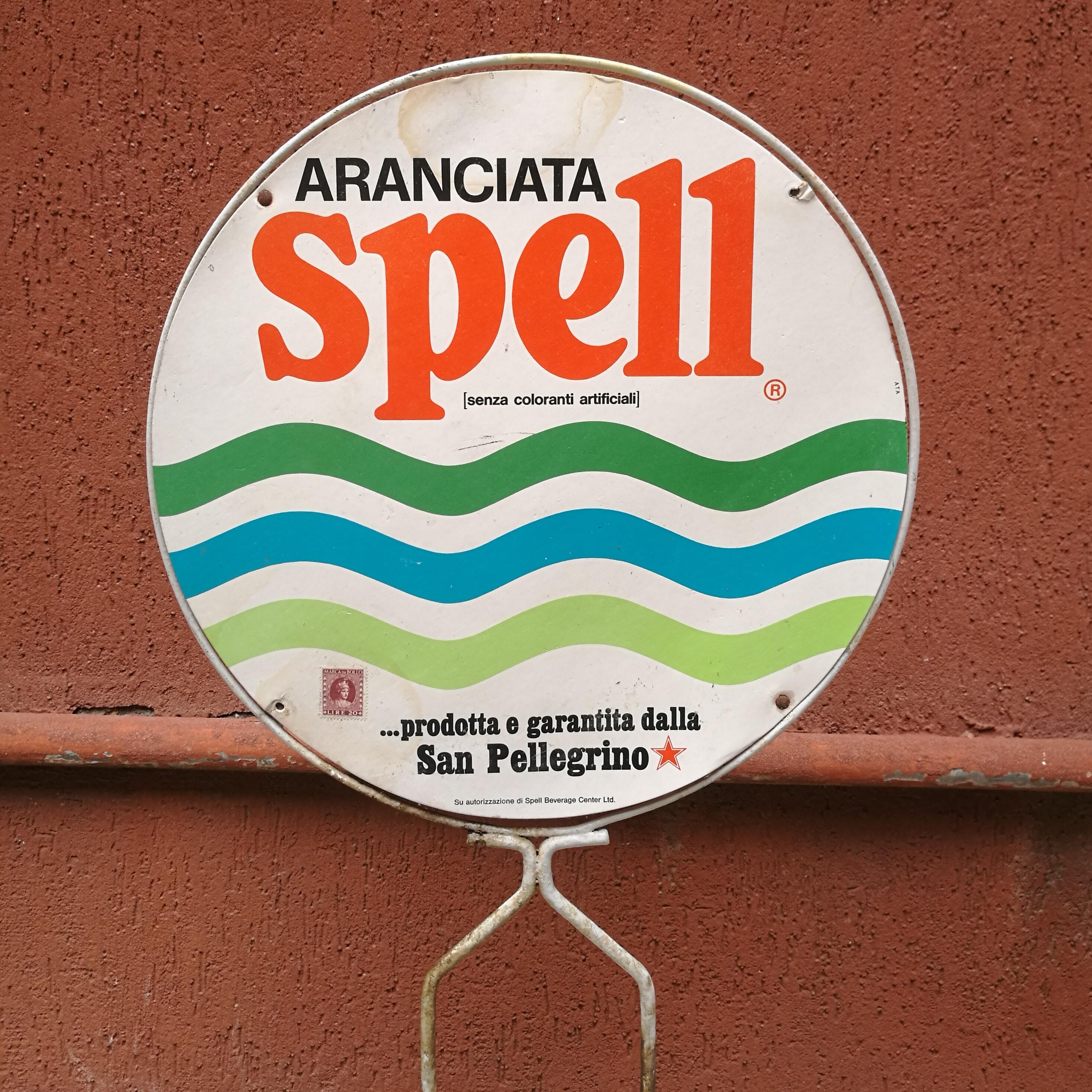 Italian advertising metal bottle holder by Spell, 1960s. Spell orange juice bottle holder with metal structure and cardboard advertising spot.
