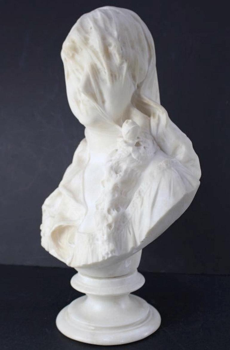 Italian Alabaster bust of a woman wearing a sheer veil with rose flower in her ponytail. Unsigned. Good condition with minor bruising to some edges.