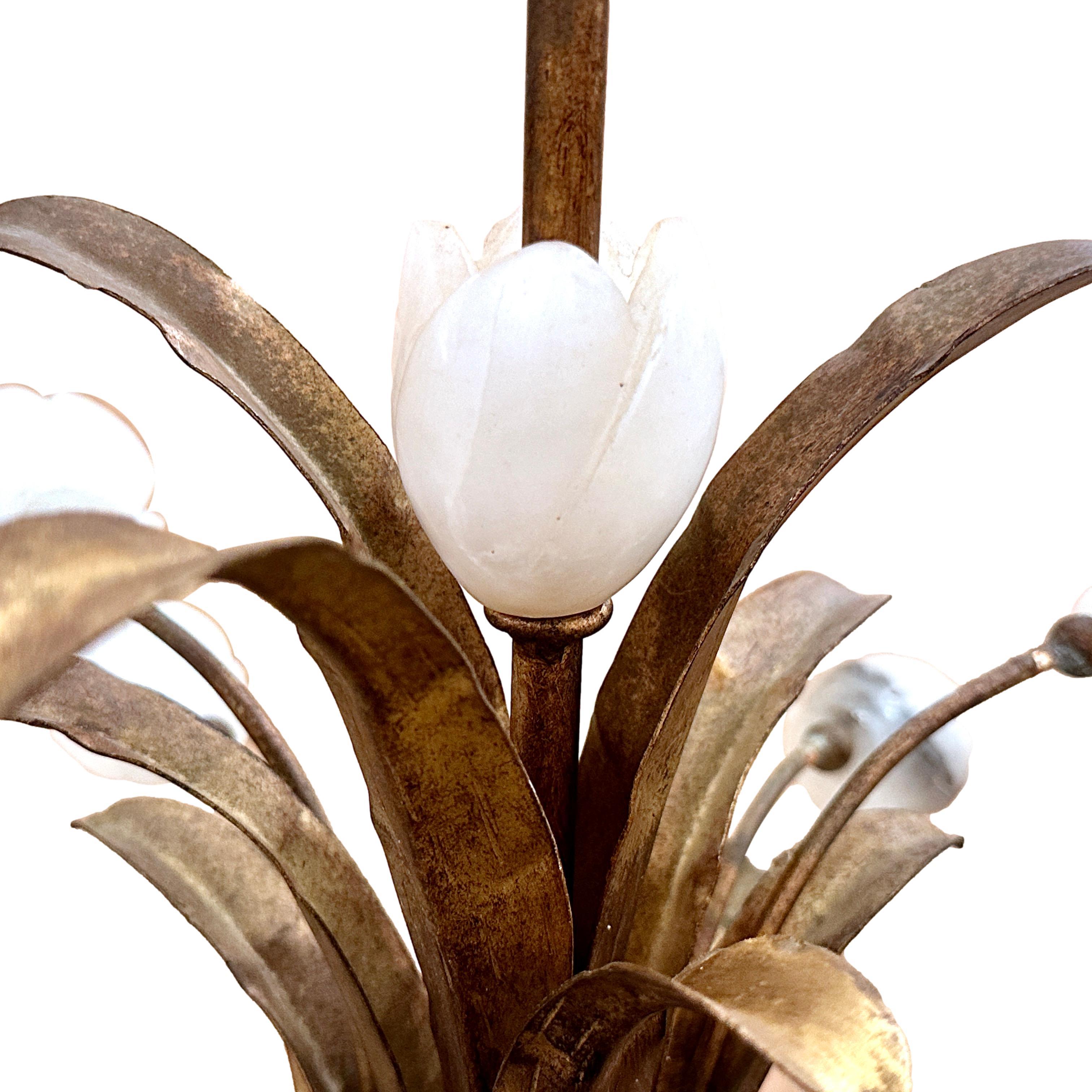 A circa 1950's Italian gilt metal and alabaster flowers table lamp.

Measurements:
Height of body: 22