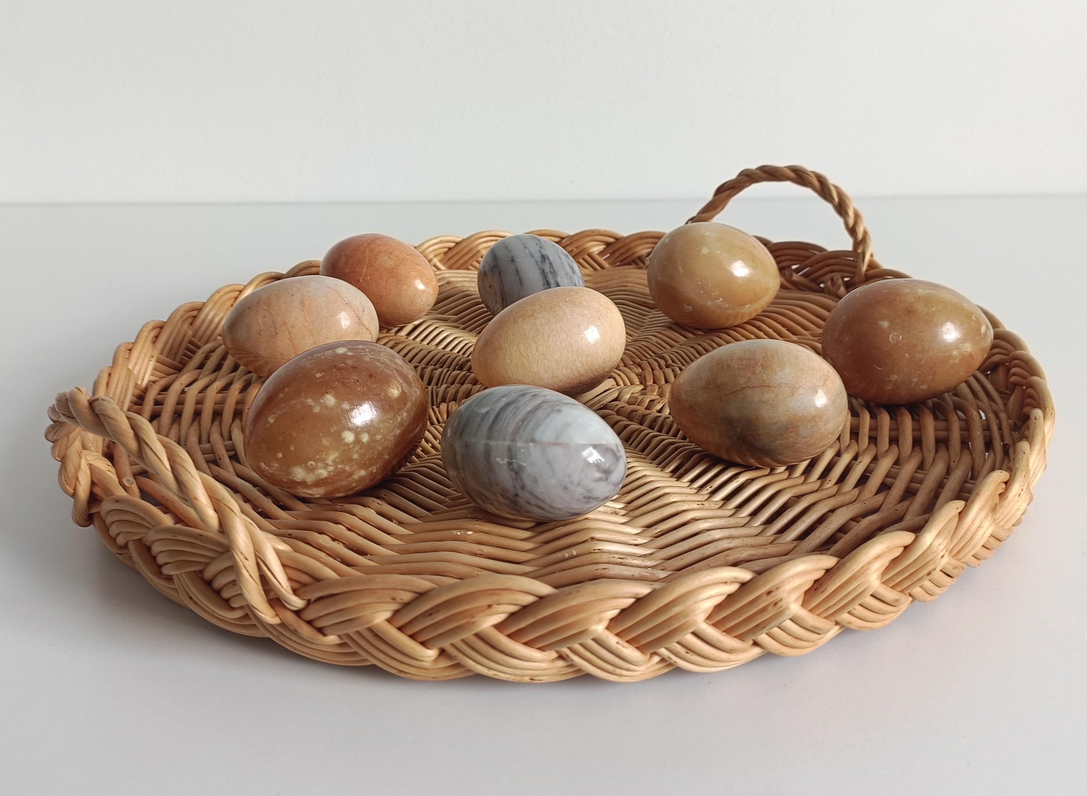 Set of Nine Italian Alabaster Egg Sculptures, circa 1970s

A beautiful set of nine alabaster egg sculptures, handmade in Italy circa the 1970s. Each egg showcases the natural veining and translucence of alabaster, in a stunning palette of marbled