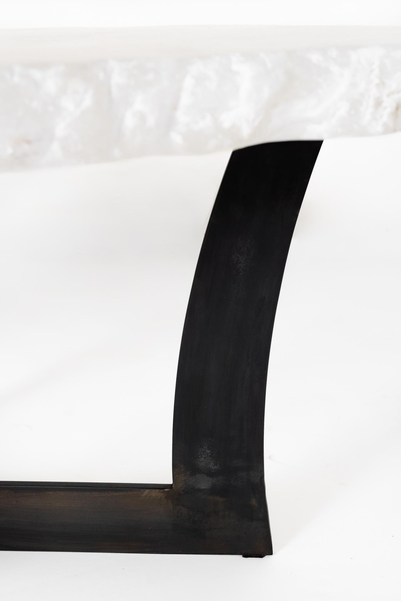 Coffee table with Italian alabaster slab on steel base. Measure: 17
