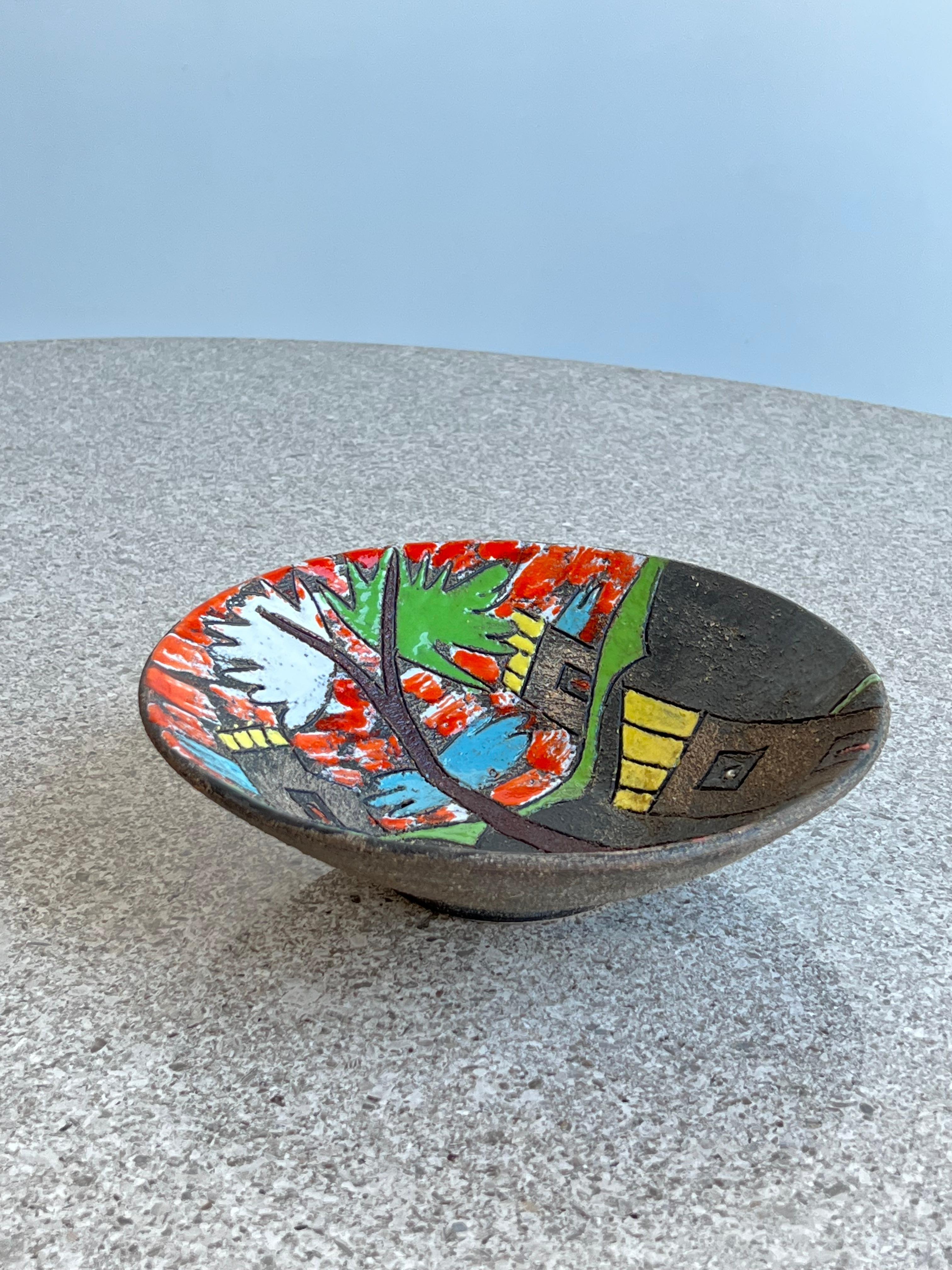 Italian Art Ceramic bowl by Aldo Londi 1960s.
Decorative plate, the art is hand painted representing a colourful land scape. 
Signature on the bottom on plate with serial number.
  