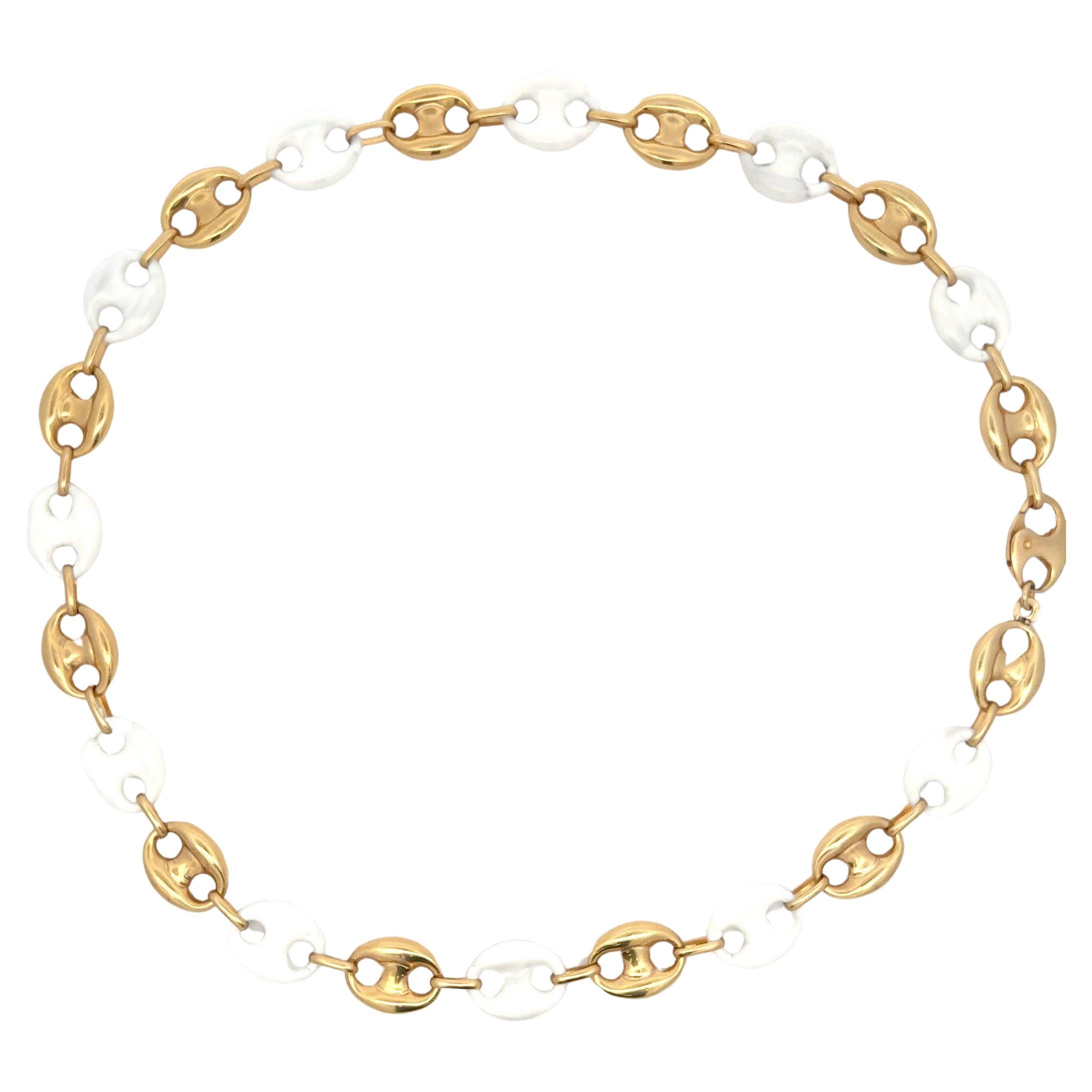 Fabriqué en Italie, ce collier présente une alternance de motifs de style Marin en émail blanc et en or jaune 14 carats, pour un poids de 25 grammes.

Disponible en différentes couleurs et bracelets
DM pour plus de photos et de prix