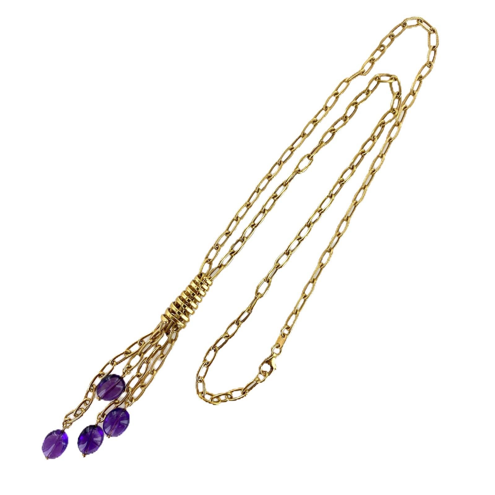 Beautiful amethyst drop link necklace fashioned in 18 karat yellow gold. The 4 cabochon amethyst gemstones dangle from the gold link drops. The link necklace measures 20 inches in length, and the drop measures 3.5 inches in length. Made in Italy. 