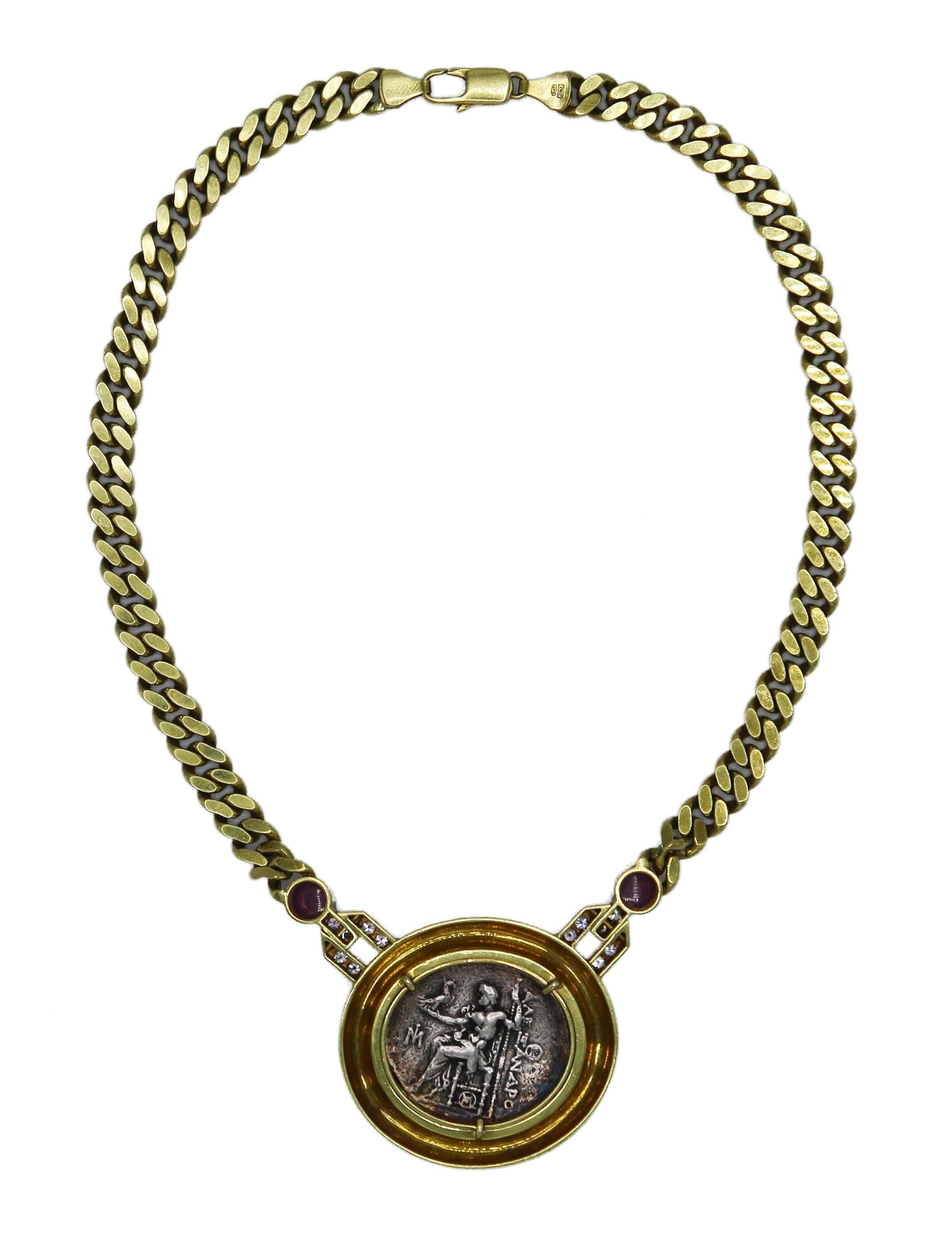 14 karat yellow gold, ancient Roman coin, ruby and diamond necklace, Italy, designed as a flat curblink chain supporting a pendant set with an ancient Roman coin within a polished yellow gold frame, set at the sides with round diamonds weighing