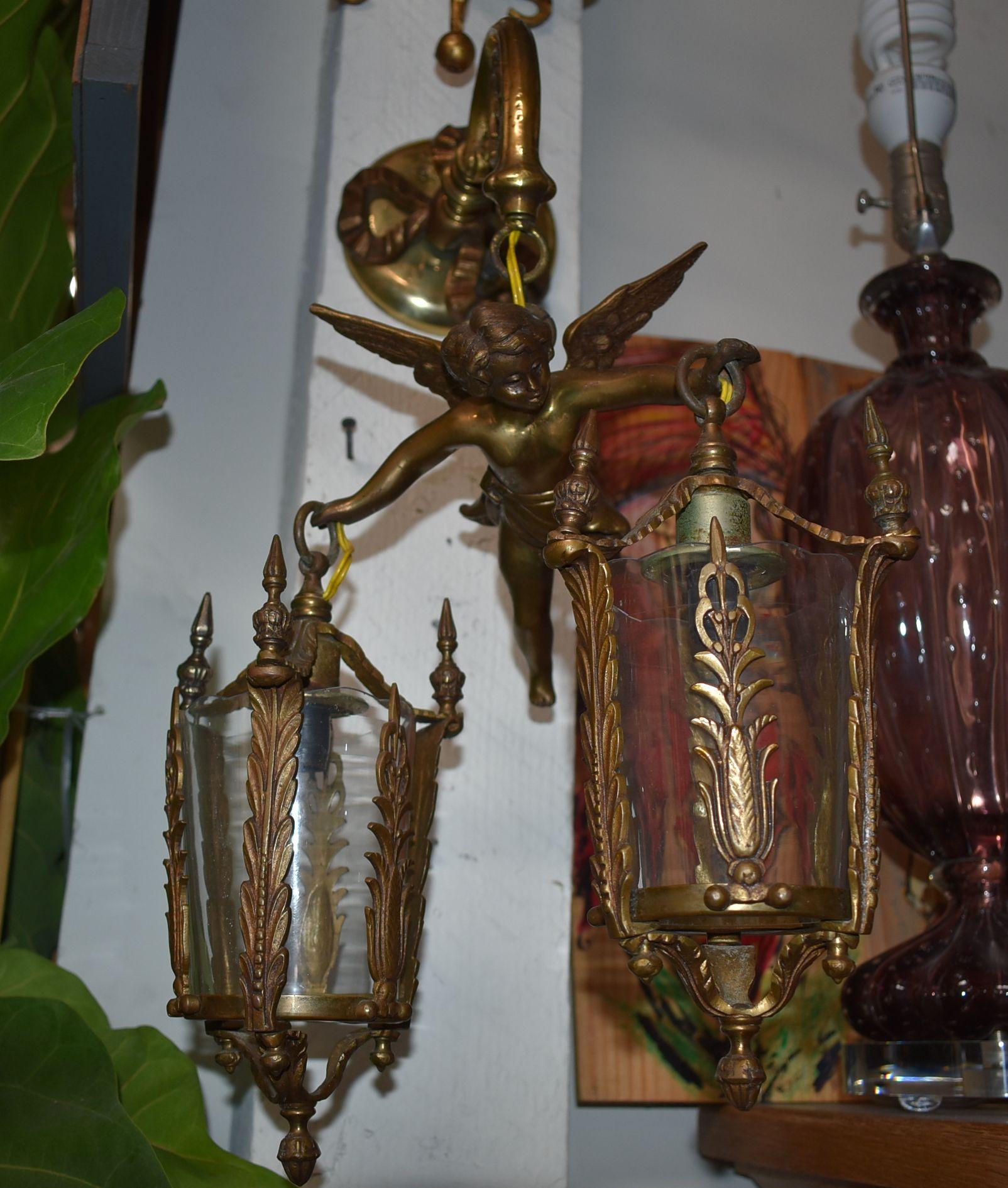 1920s Single two lights bronze flying angel sconce.