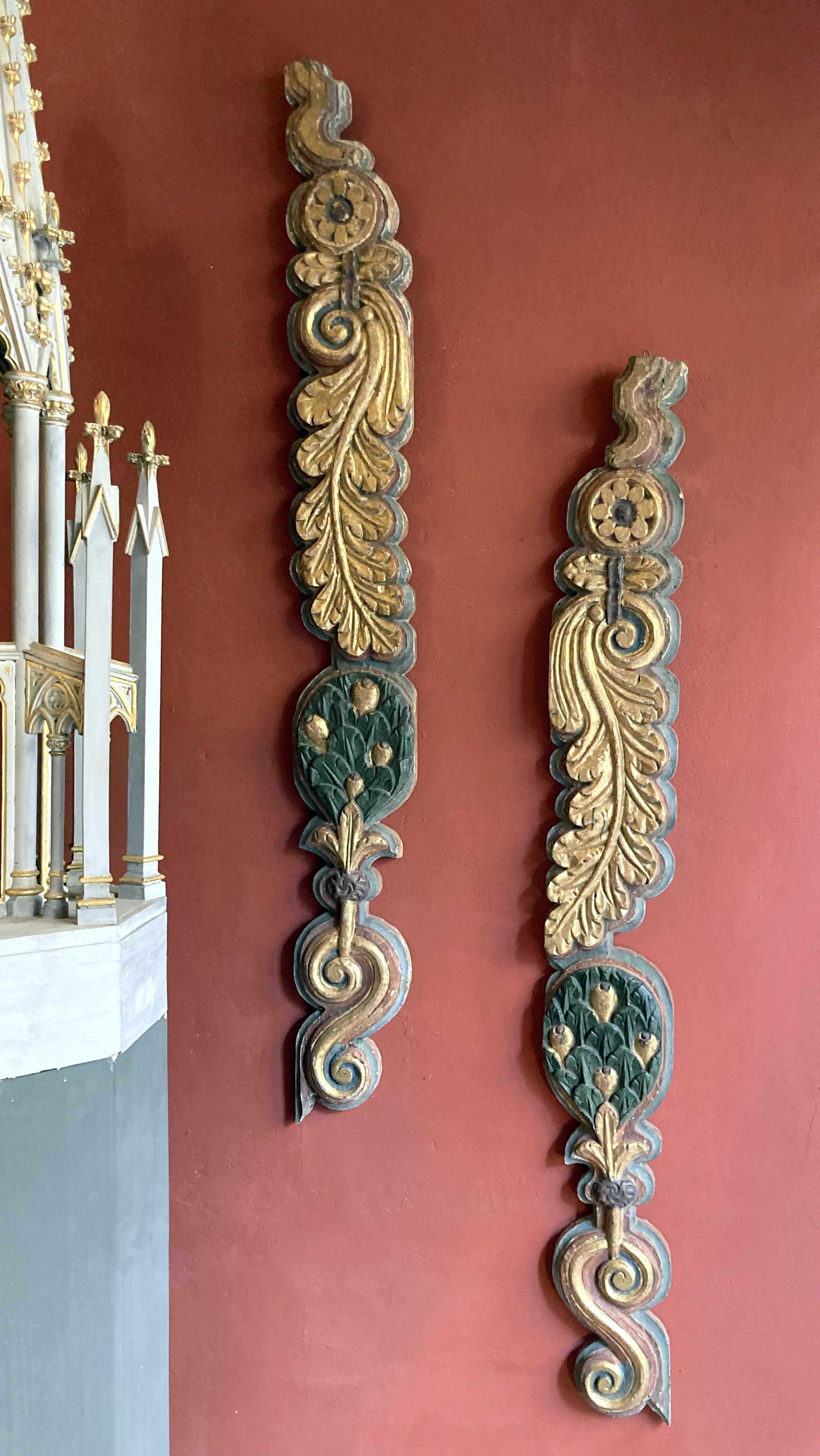 This pair of Italian 18th century (early 1700) hugely decorative archictectural pilasters friezes is deeply hand carved with a wonderful compositions of fruits, flowers and leaves, the whole hand painted, lacquered and gilded. These pillars are an