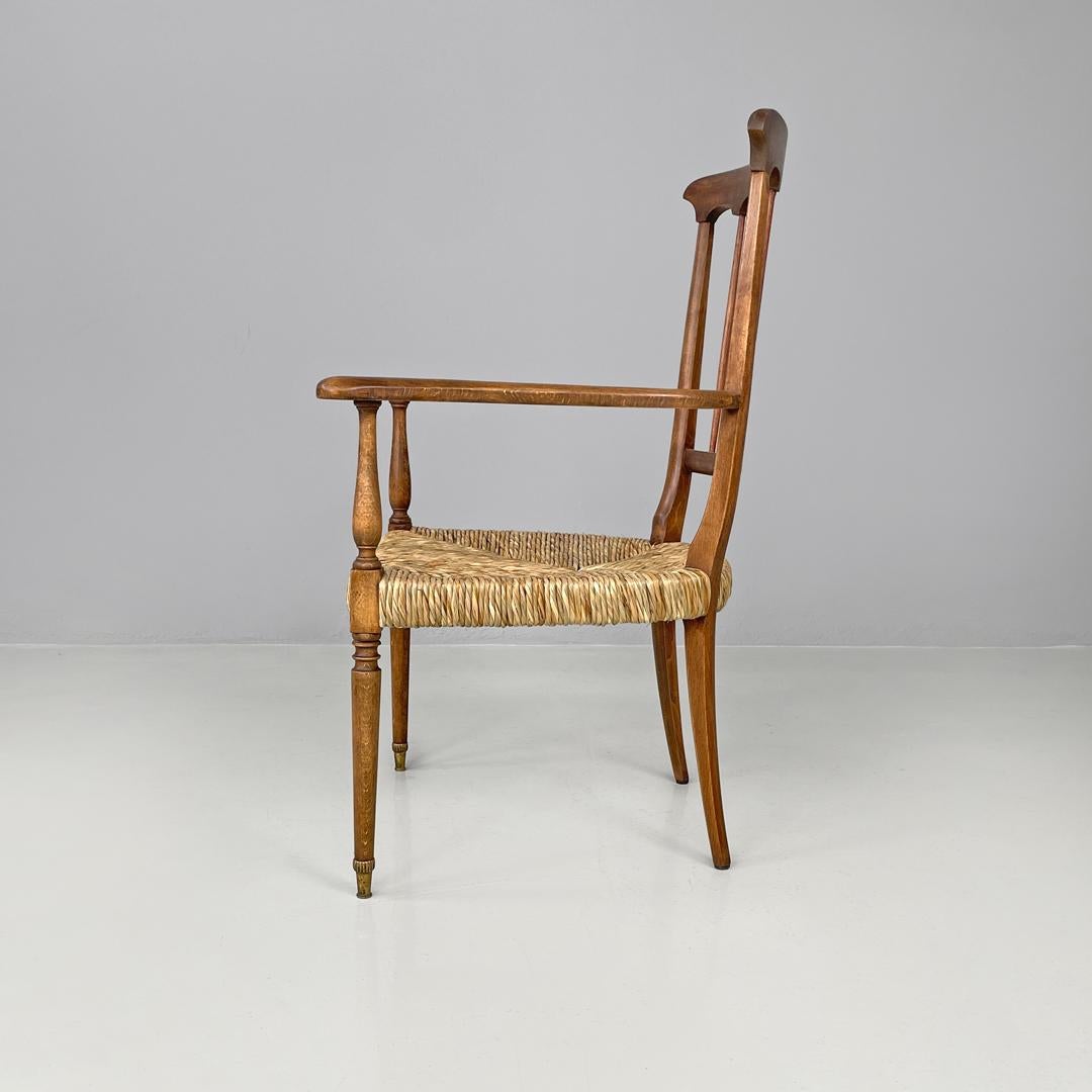 Straw Italian mid-century modern armchairs wood and straw with two brass feet, 1950s For Sale