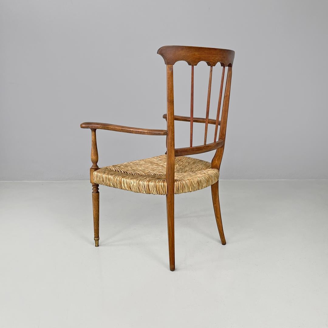 Italian mid-century modern armchairs wood and straw with two brass feet, 1950s For Sale 1