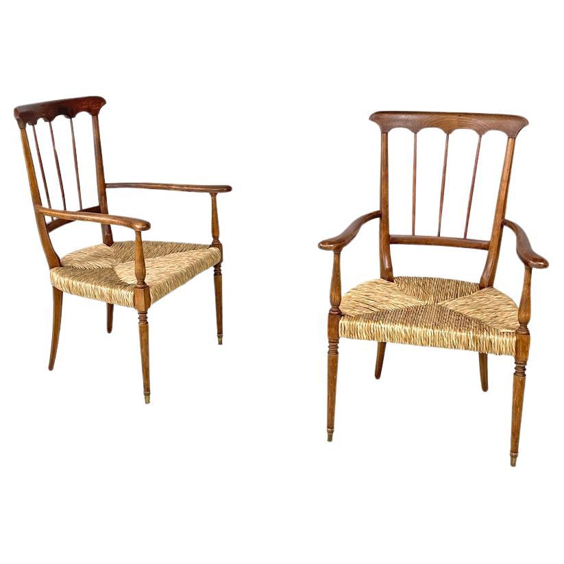 Italian mid-century modern armchairs wood and straw with two brass feet, 1950s For Sale