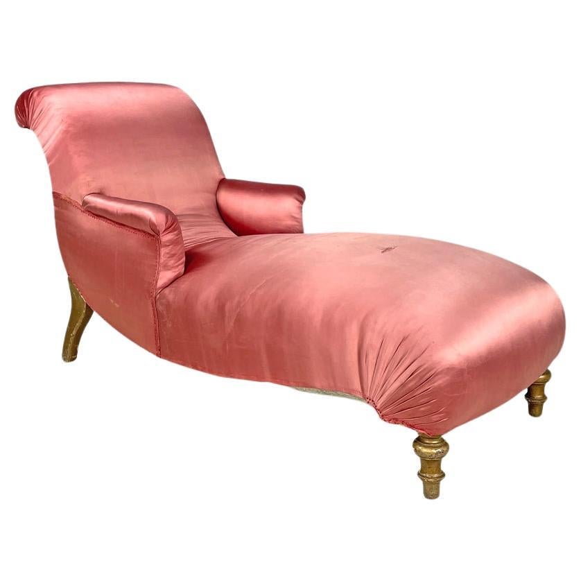 Italian antique chaise longue in pink satin and golden wood with armrests, 1800s