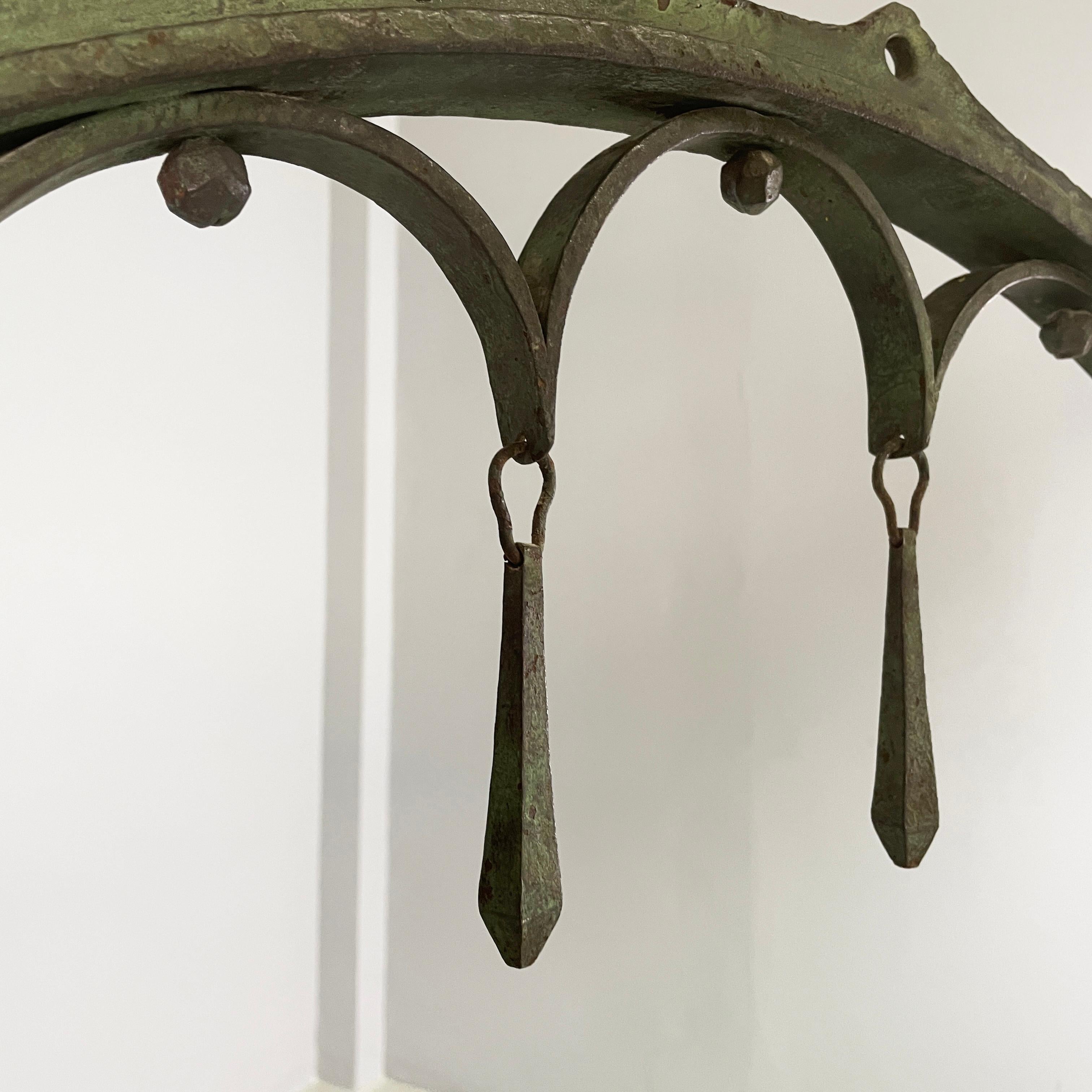 Italian antique Chandelier with eight lights in crafted wrought iron, 1930s For Sale 9