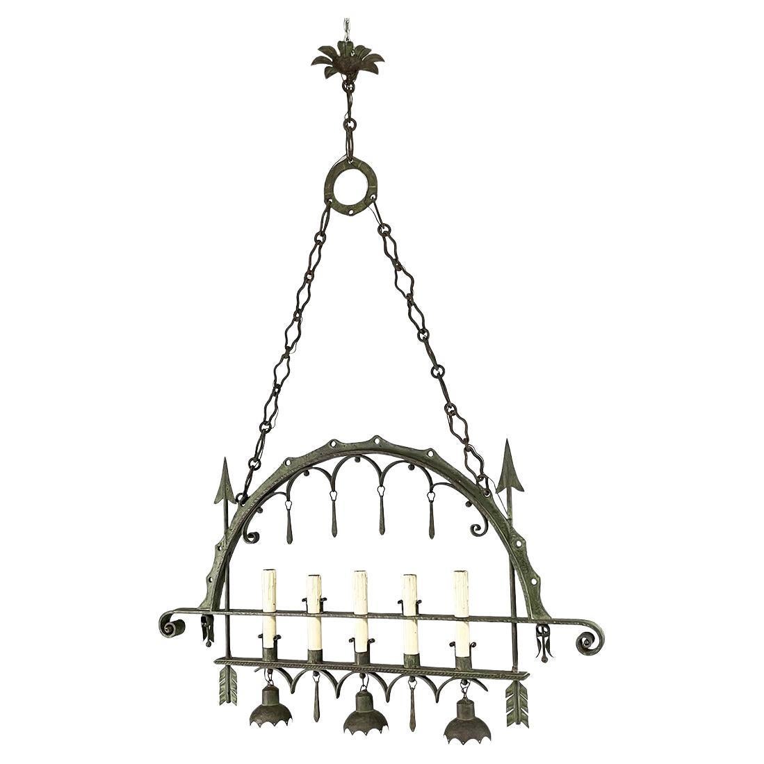 Italian antique Chandelier with eight lights in crafted wrought iron, 1930s