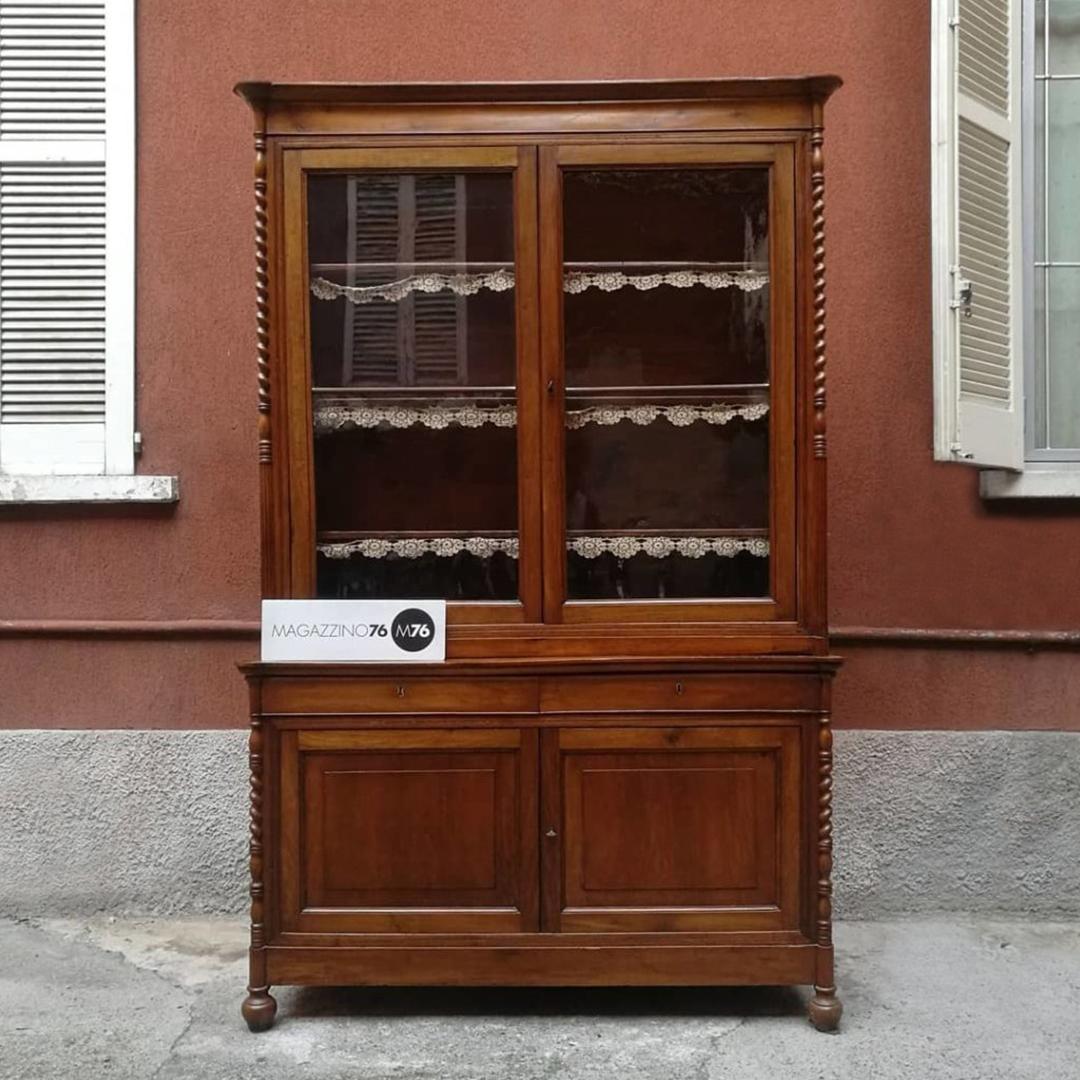 Cherrywood and glass highboard from the early 1900s. Lower part with two doors and two drawers, upper part with glass doors, cherrywood framed, and three shelves inside.
Perfect condition
Measures: 125 x 55 x 230 H cm.
   